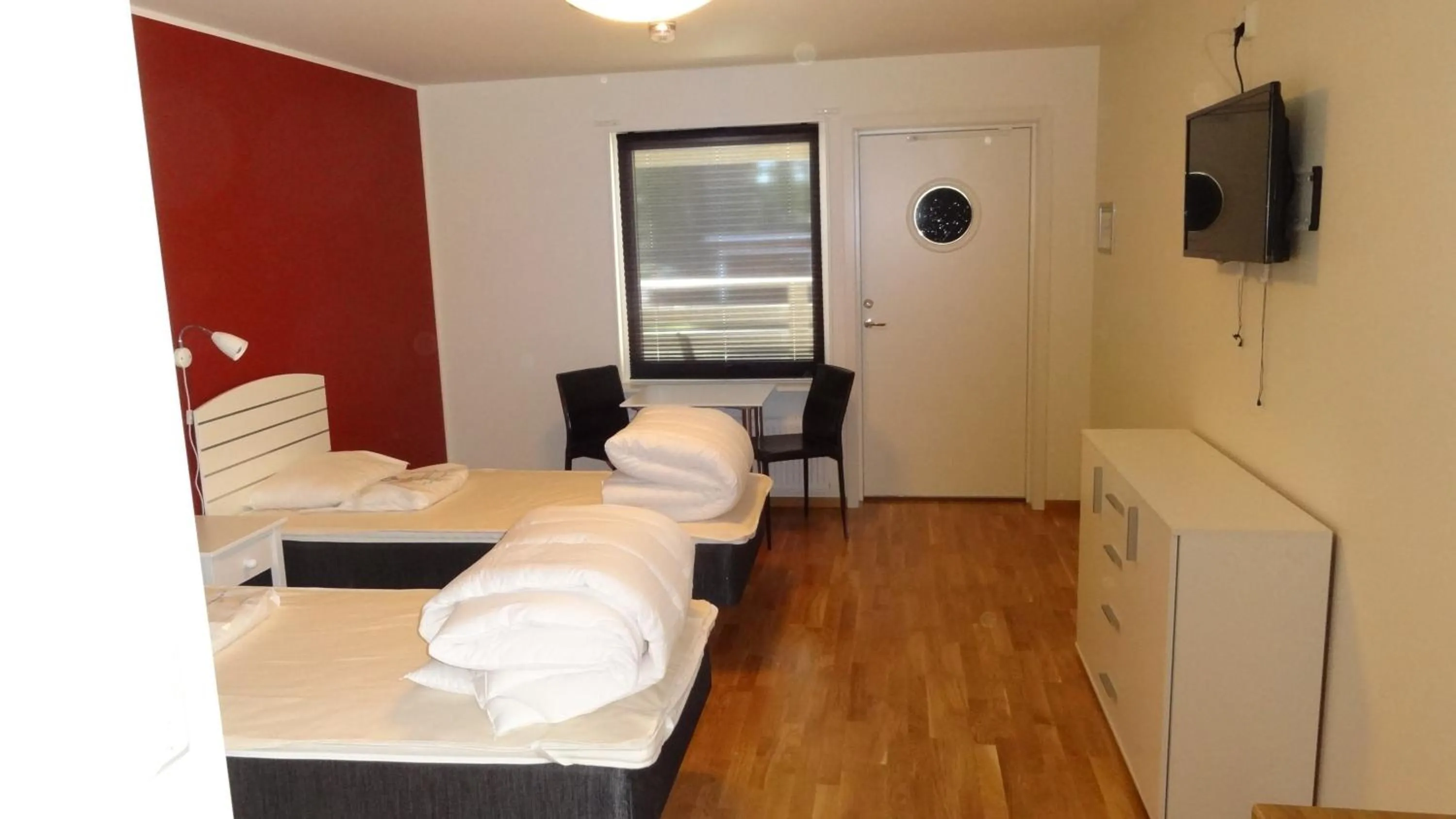 Photo of the whole room, Bed in Piteå Golfhotell