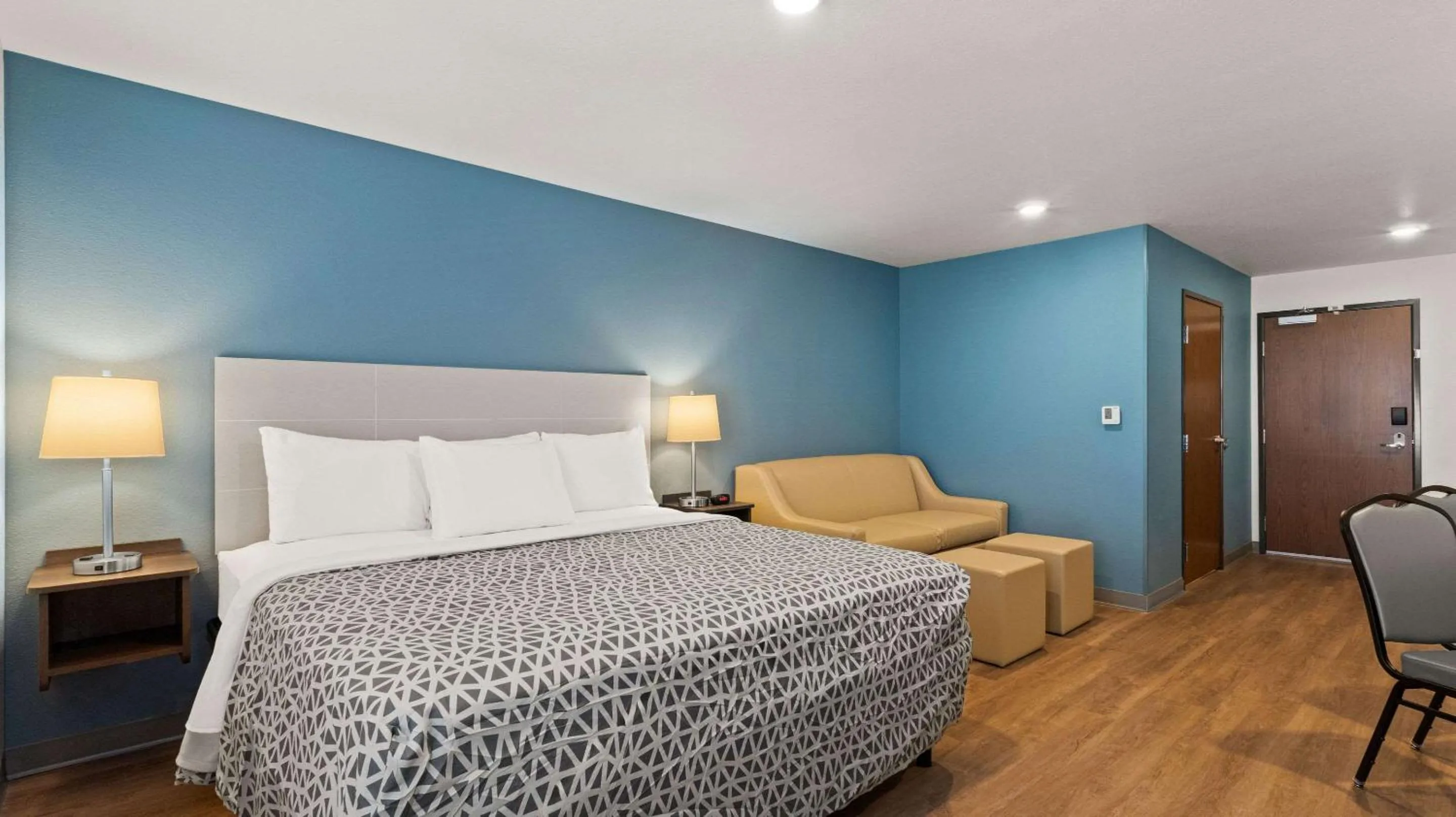 Bedroom, Bed in WoodSpring Suites Greeley