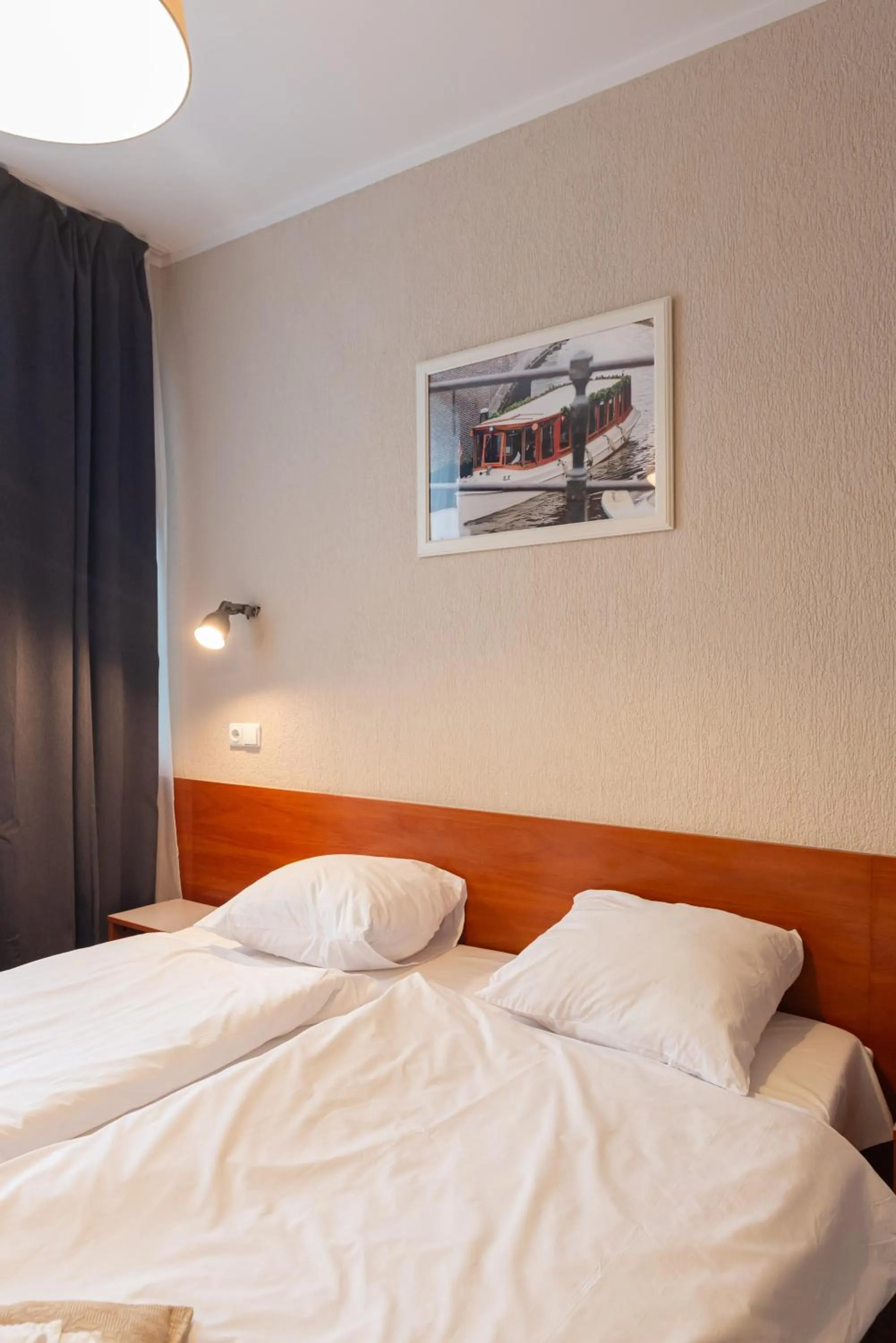 Bed in Inza Guest House