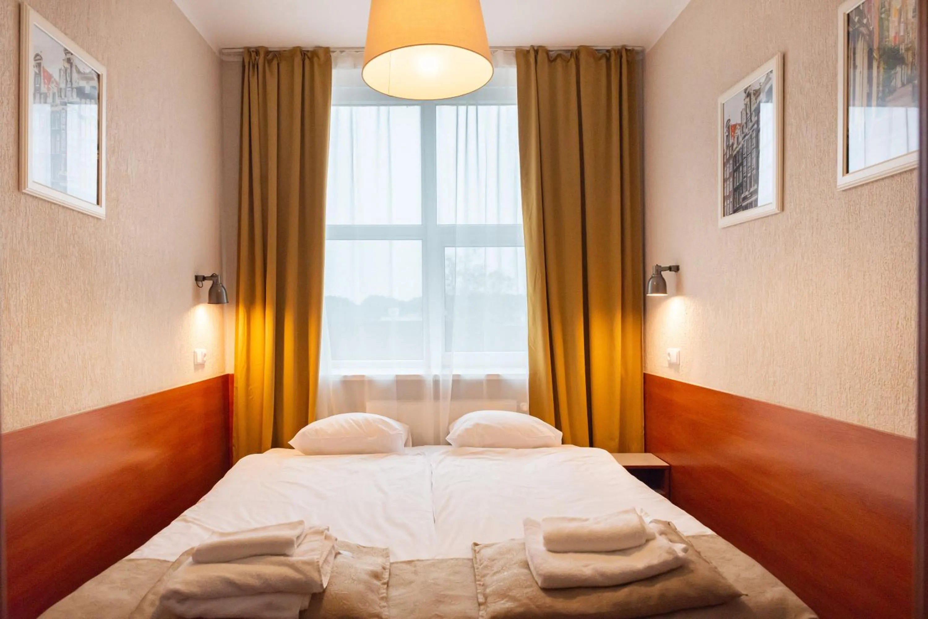 Bed in Inza Guest House