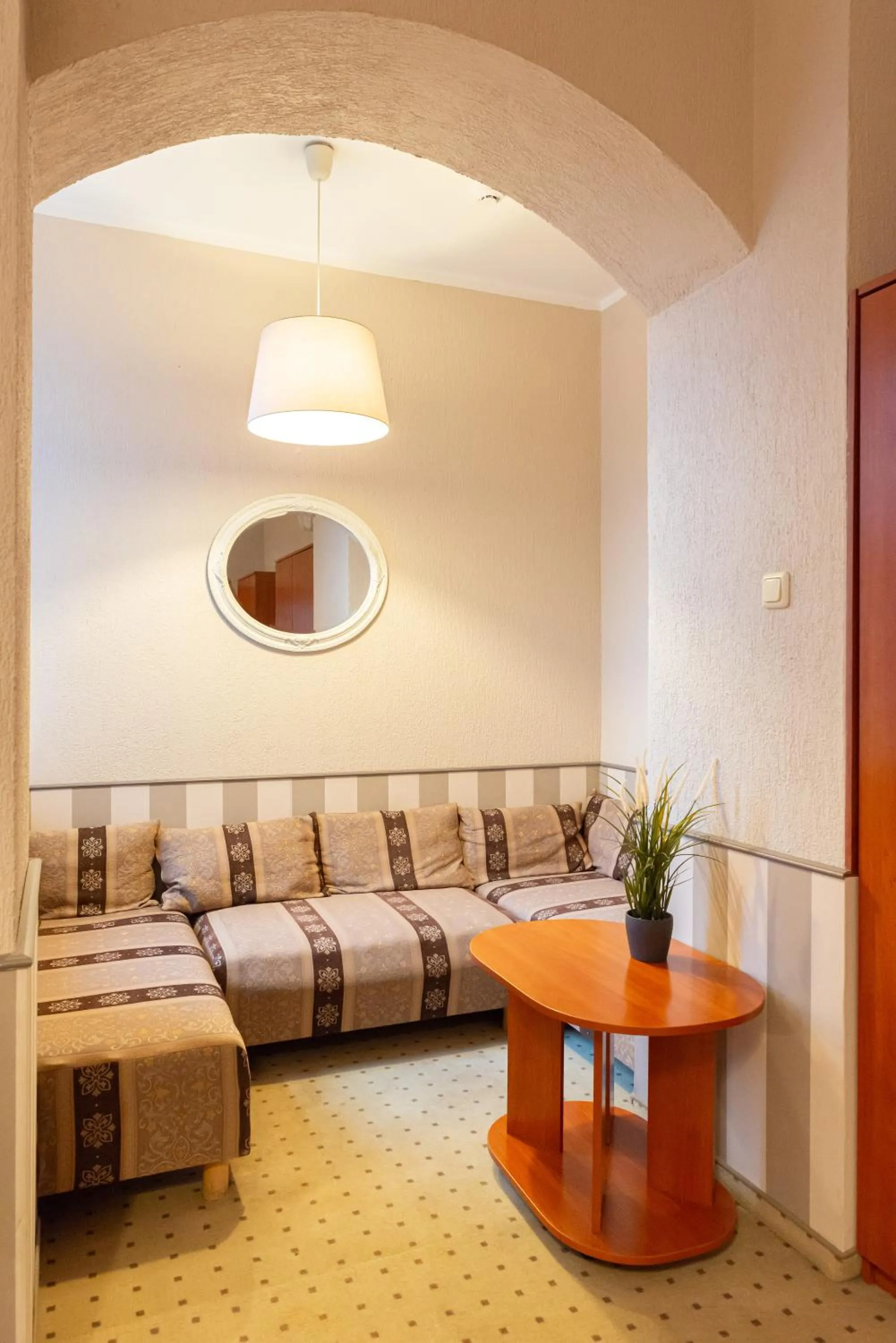 Seating area, Bed in Inza Guest House