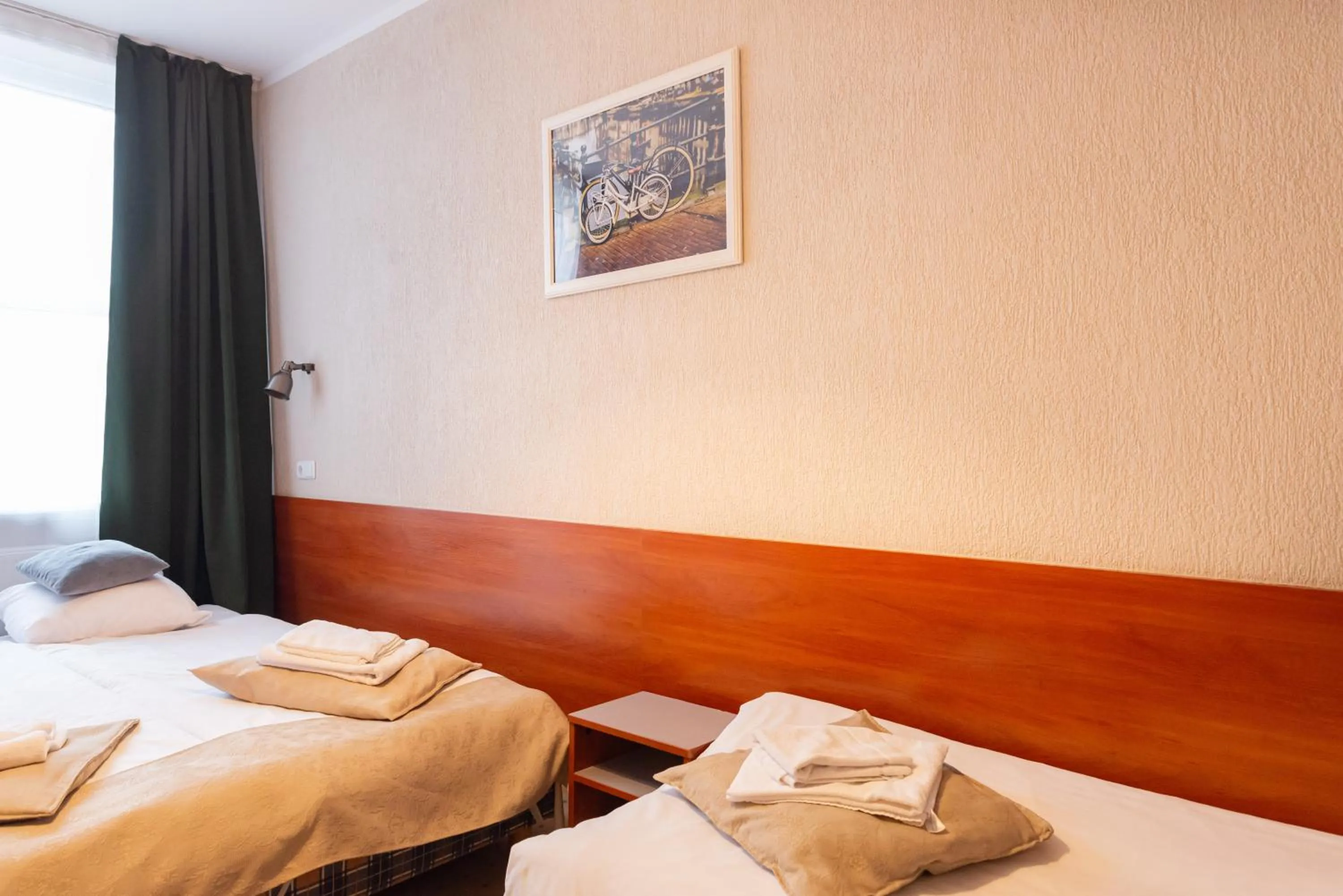 Bed in Inza Guest House