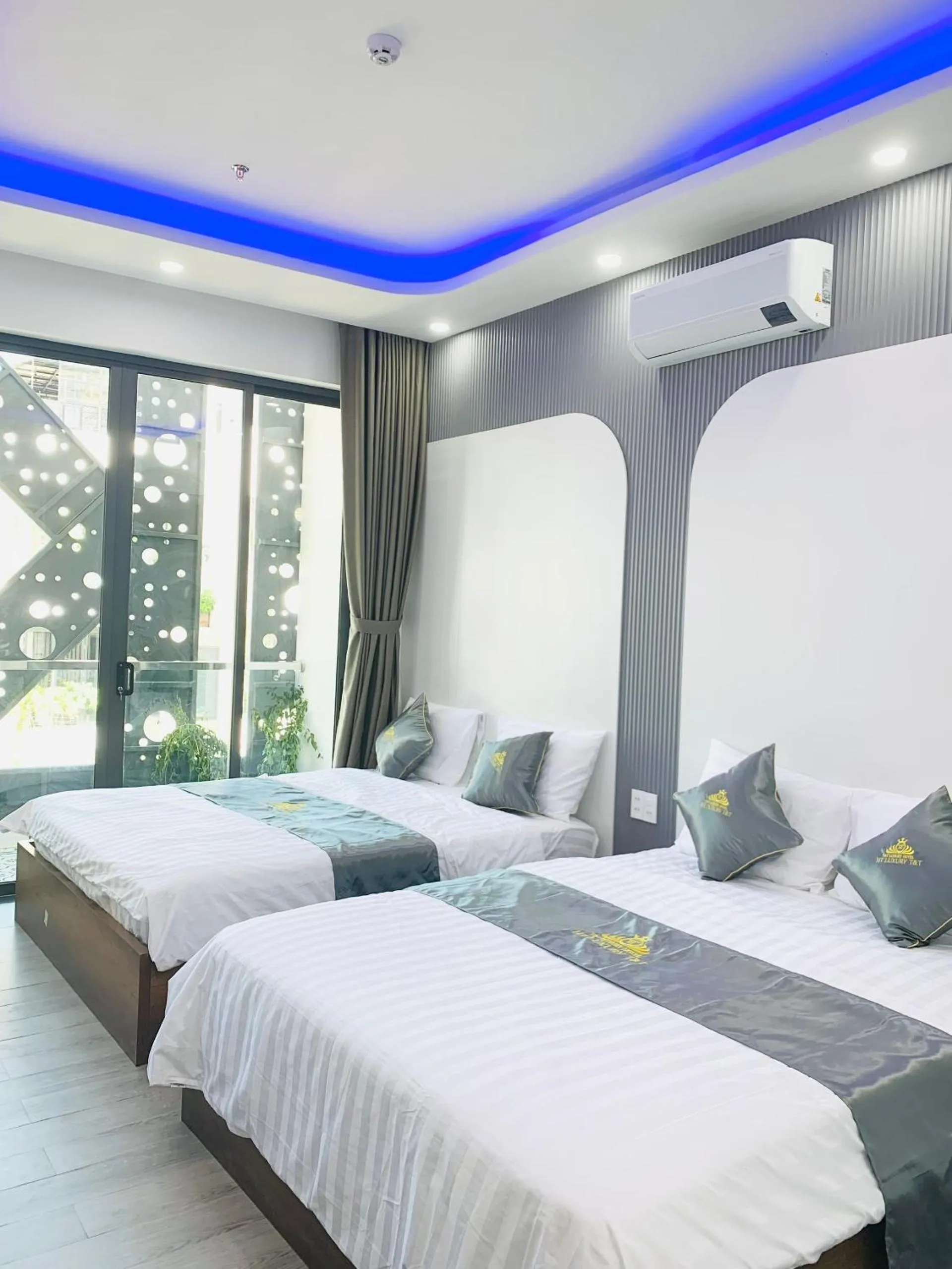 Bed in T&T Luxury Hotel