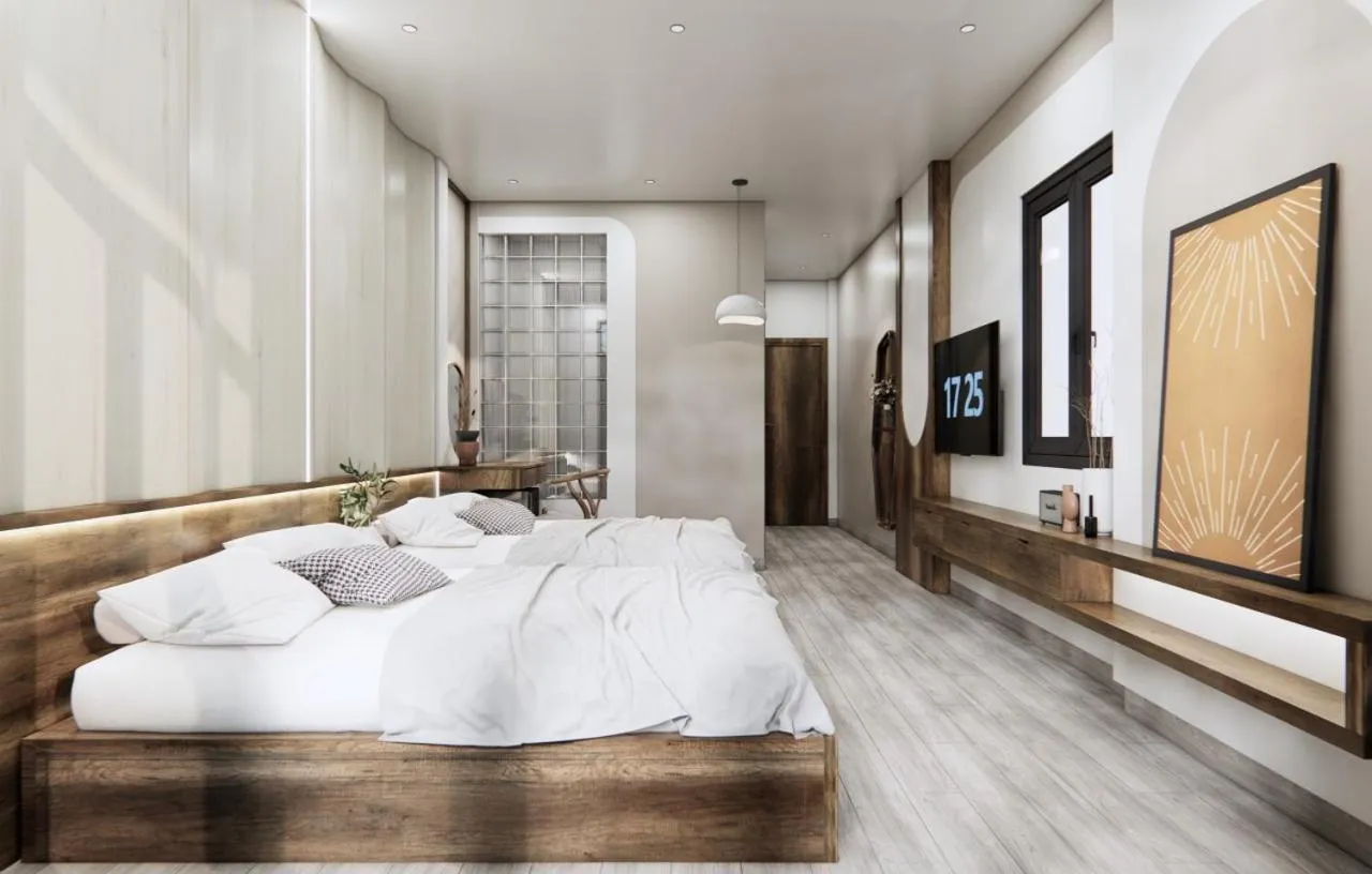 Bed in T&T Luxury Hotel