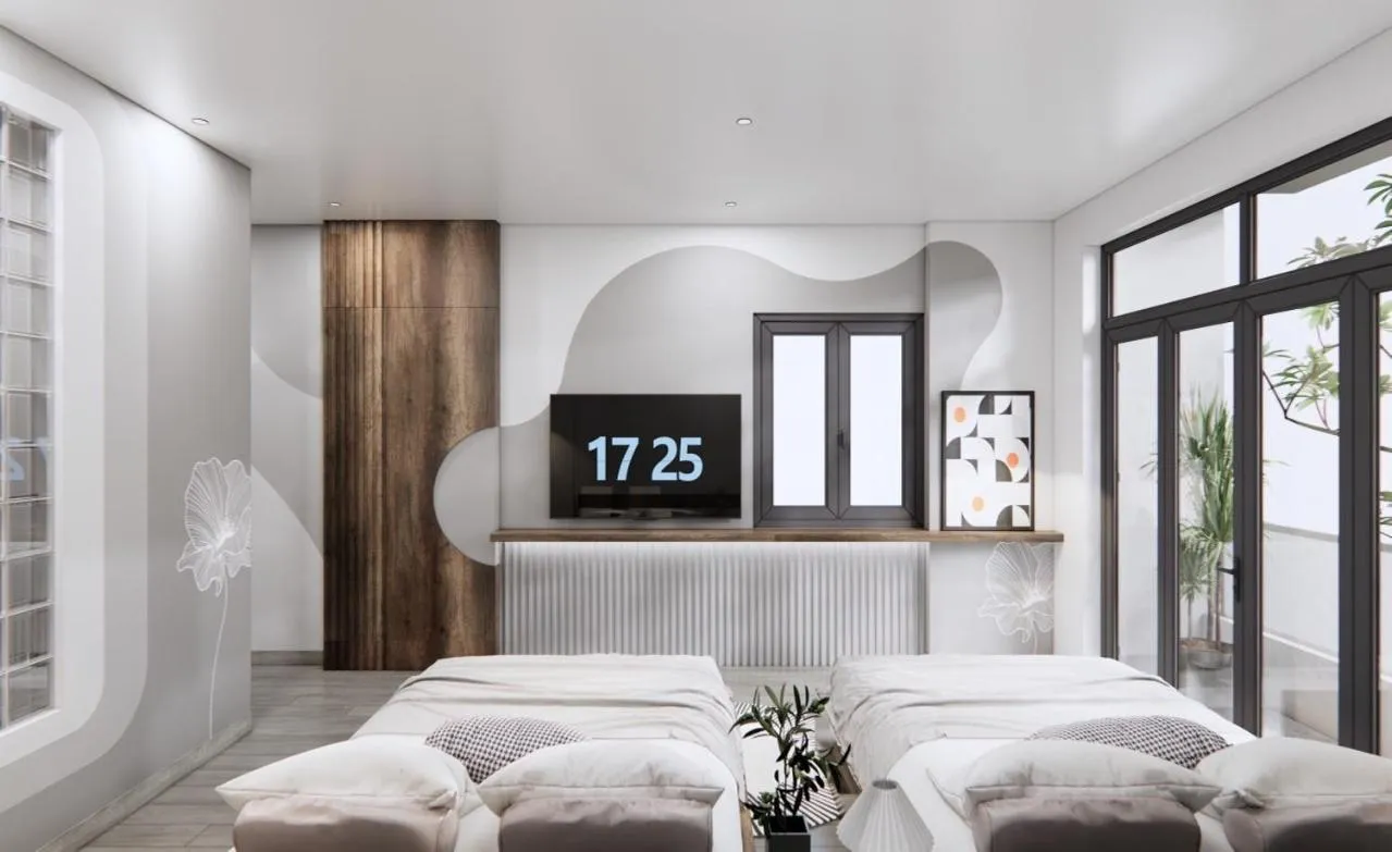 Bed in T&T Luxury Hotel