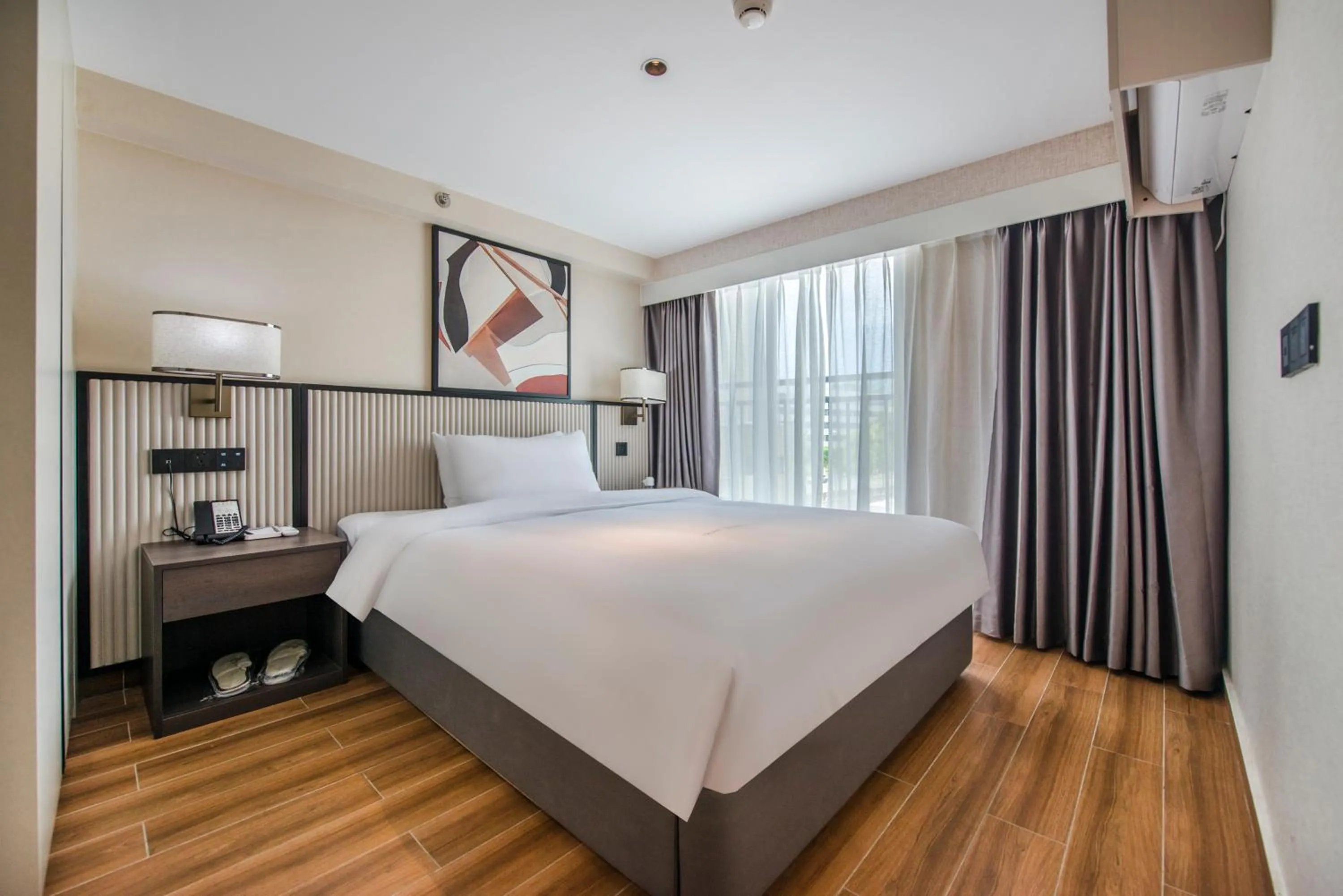 Bed in Baytop Living of Guangzhou Drimin House Hotel - Canton Fair Free Shuttle Bus