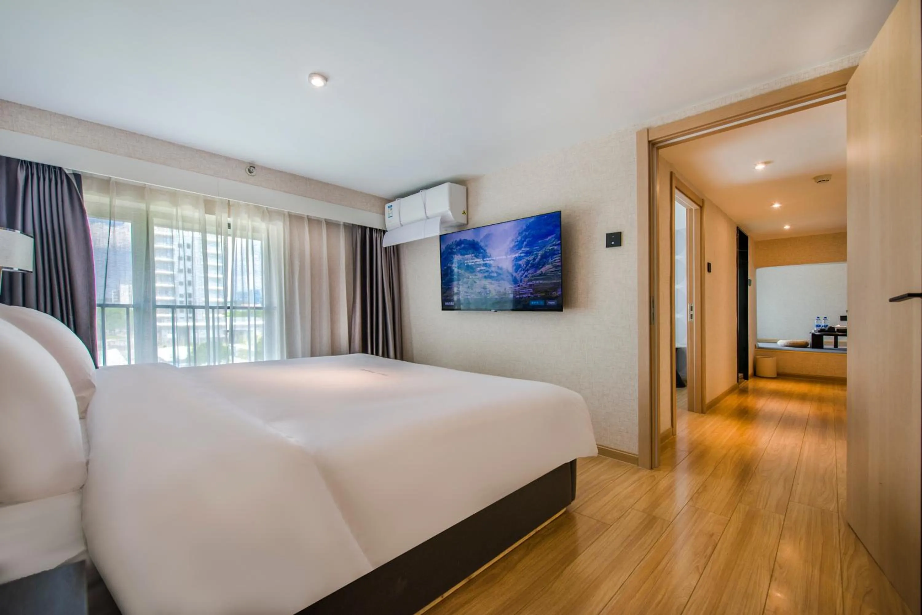 Bed in Baytop Living of Guangzhou Drimin House Hotel - Canton Fair Free Shuttle Bus