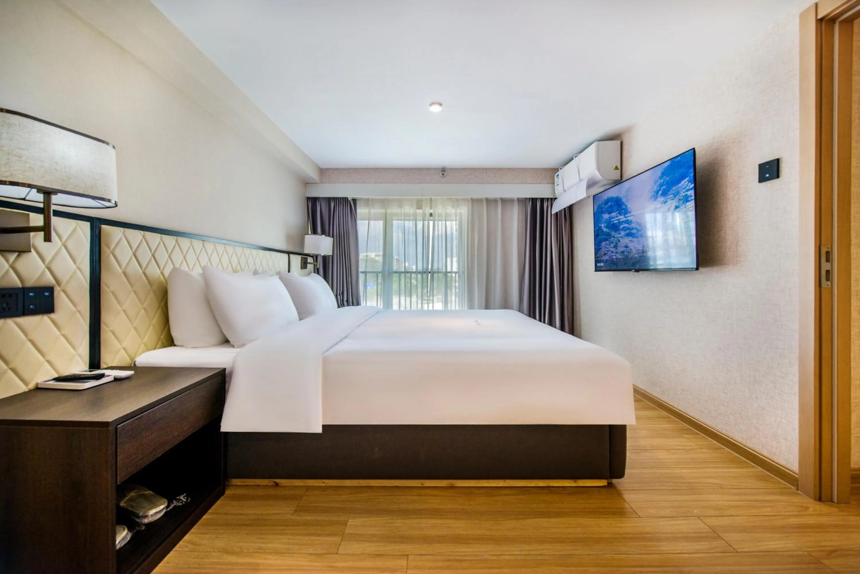Bed in Baytop Living of Guangzhou Drimin House Hotel - Canton Fair Free Shuttle Bus