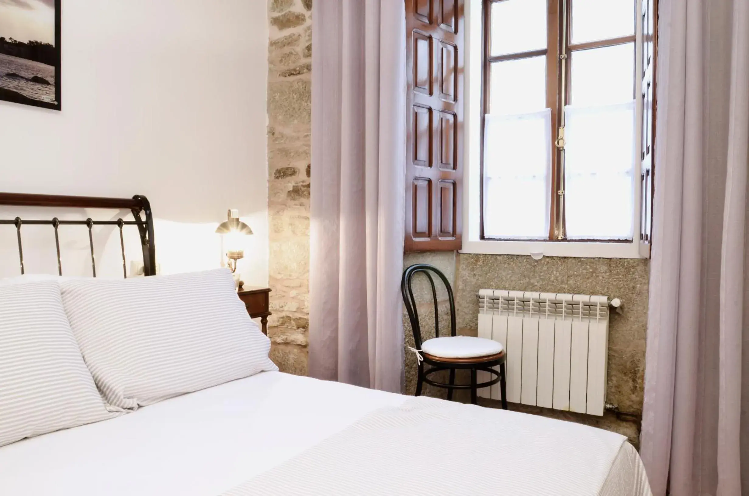 Decorative detail, Bed in Sete Artes by Como en Casa Decorative detail, Bed in Sete Artes by Como en Casa