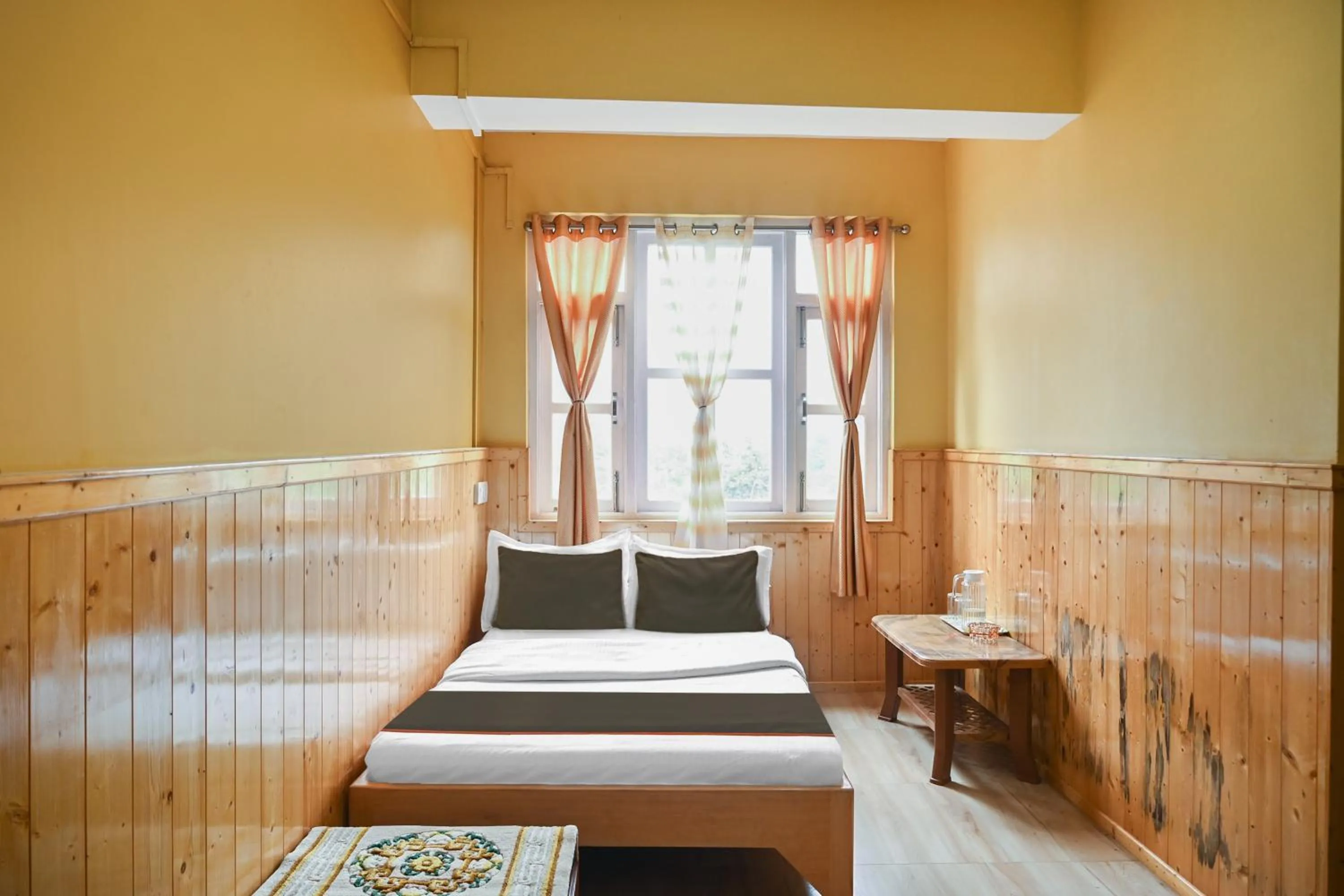 Bedroom in Hotel O Kaizen Residency