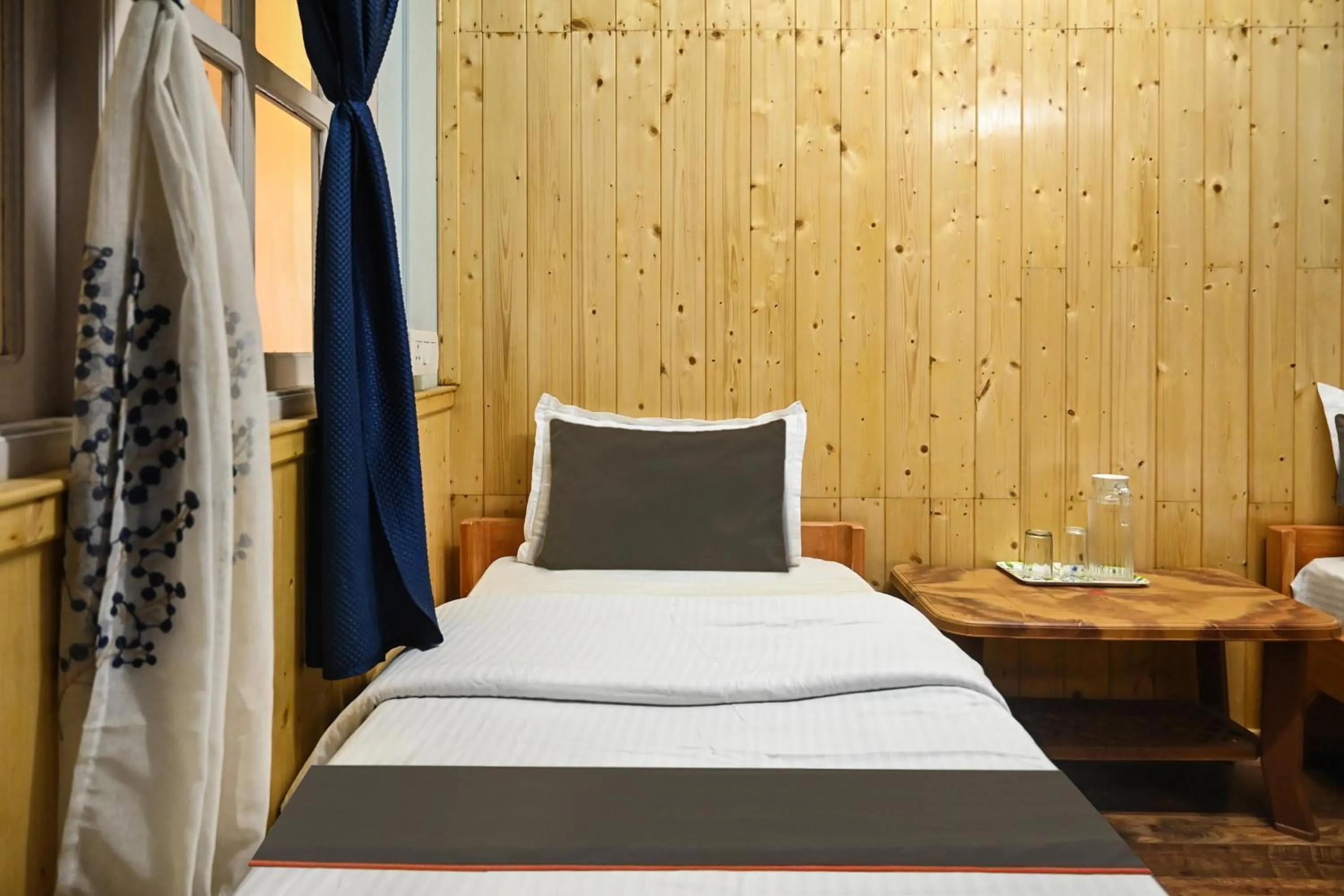 Bedroom in Hotel O Kaizen Residency