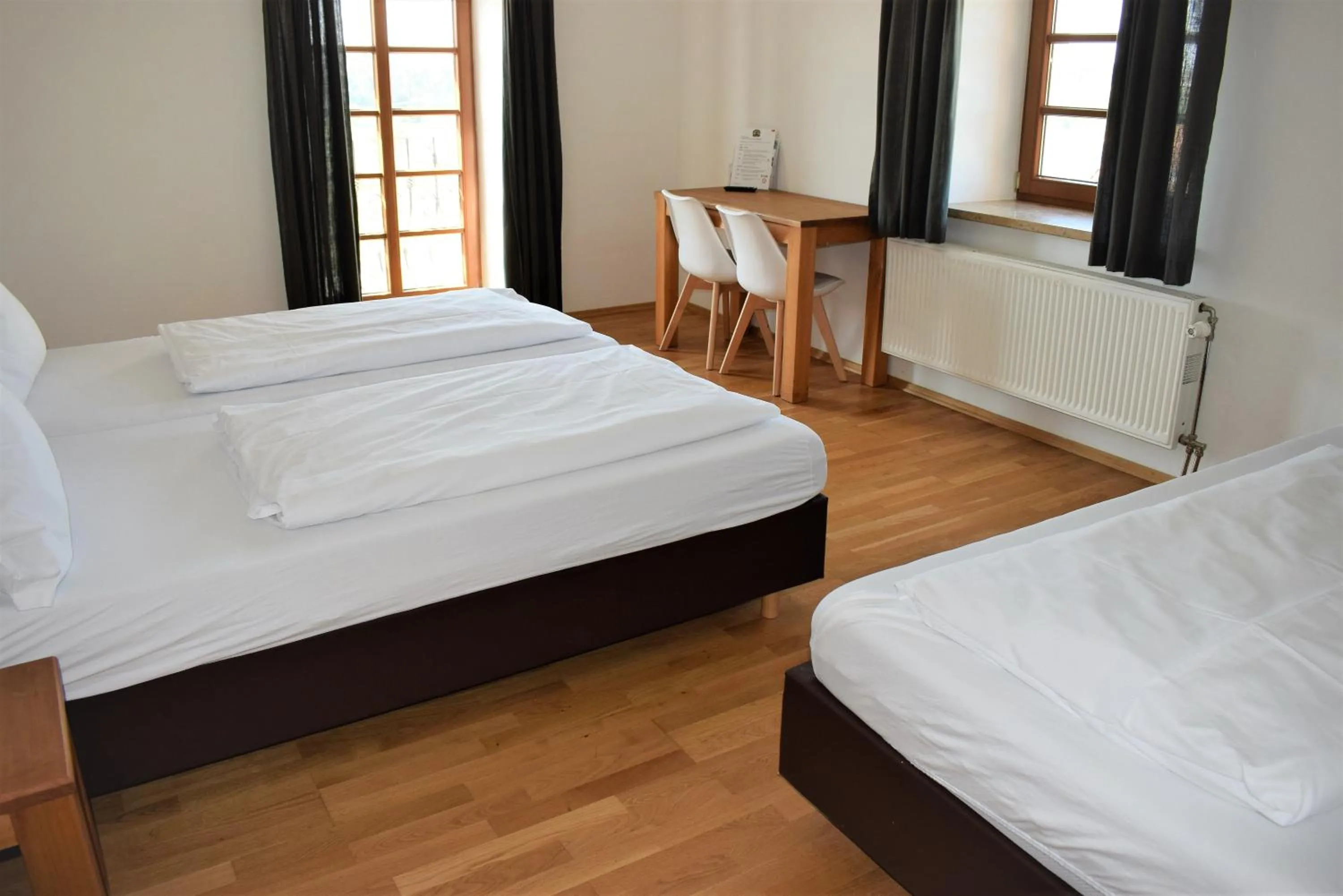 Photo of the whole room, Bed in Hotel Stanglbräu