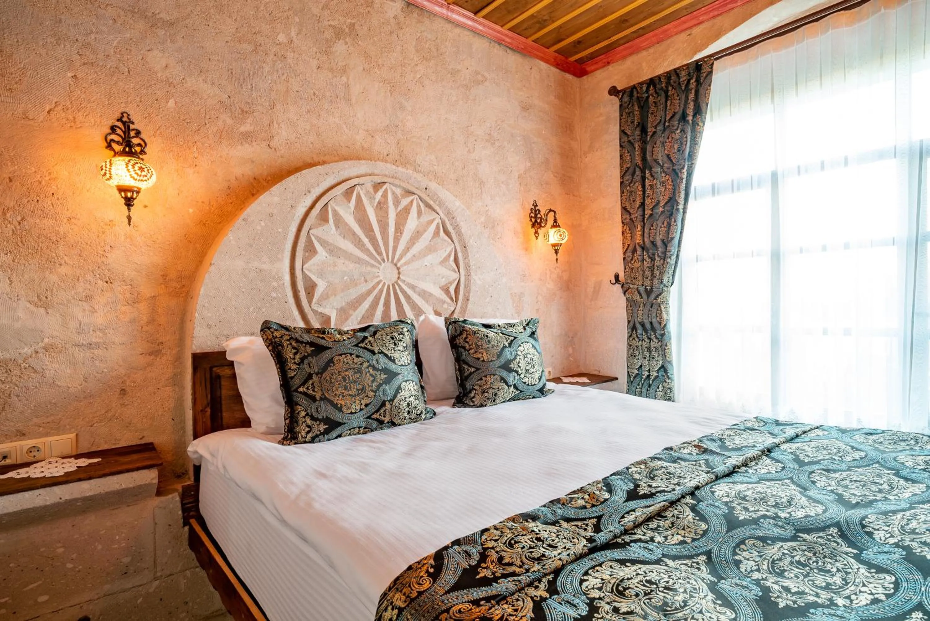 Bed in CAPPANAR CAVE HOTEL