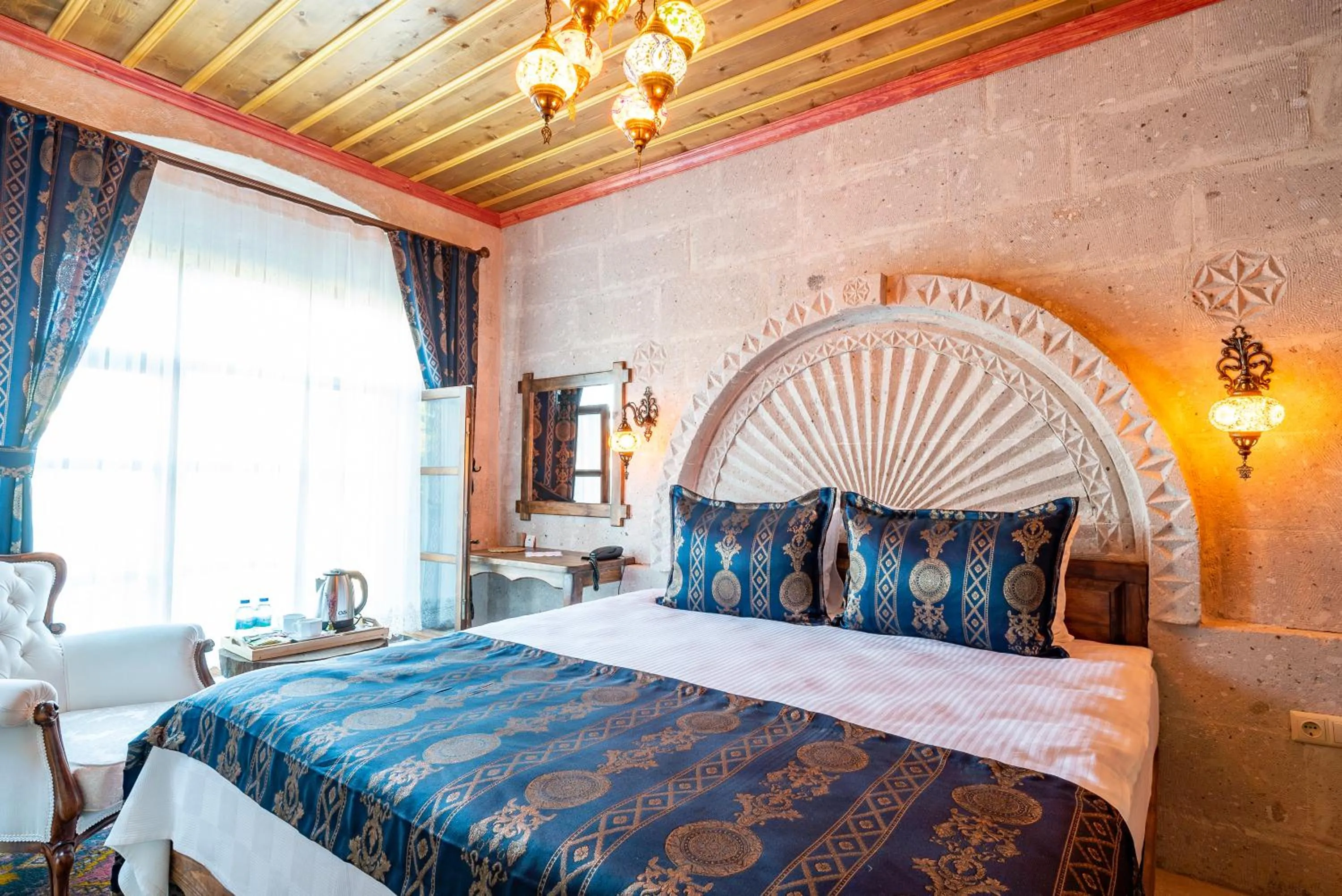 Bed in CAPPANAR CAVE HOTEL