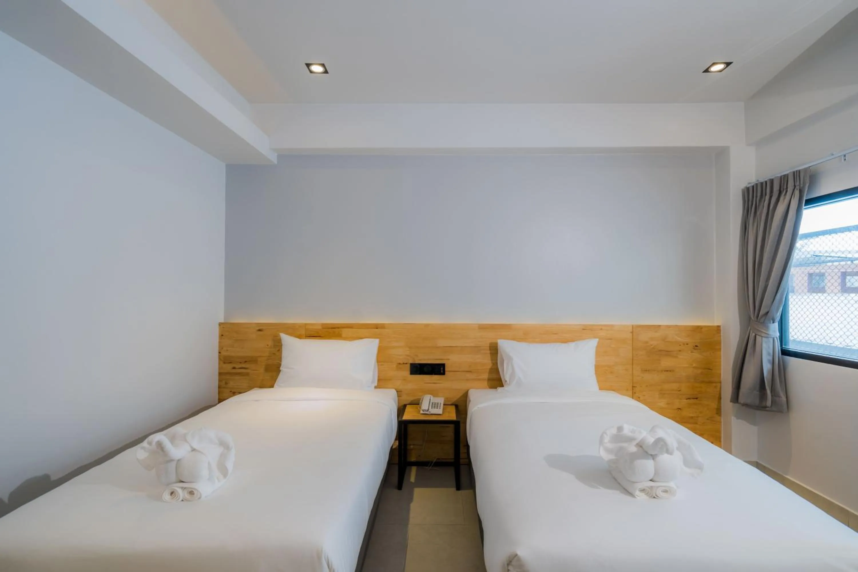 Bed in Lek Lek Samui Room X Coffee Bar