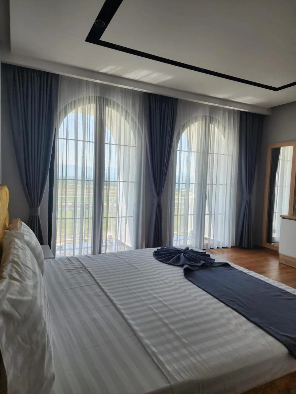 Bed in Imperador Palace Hotel Restorant