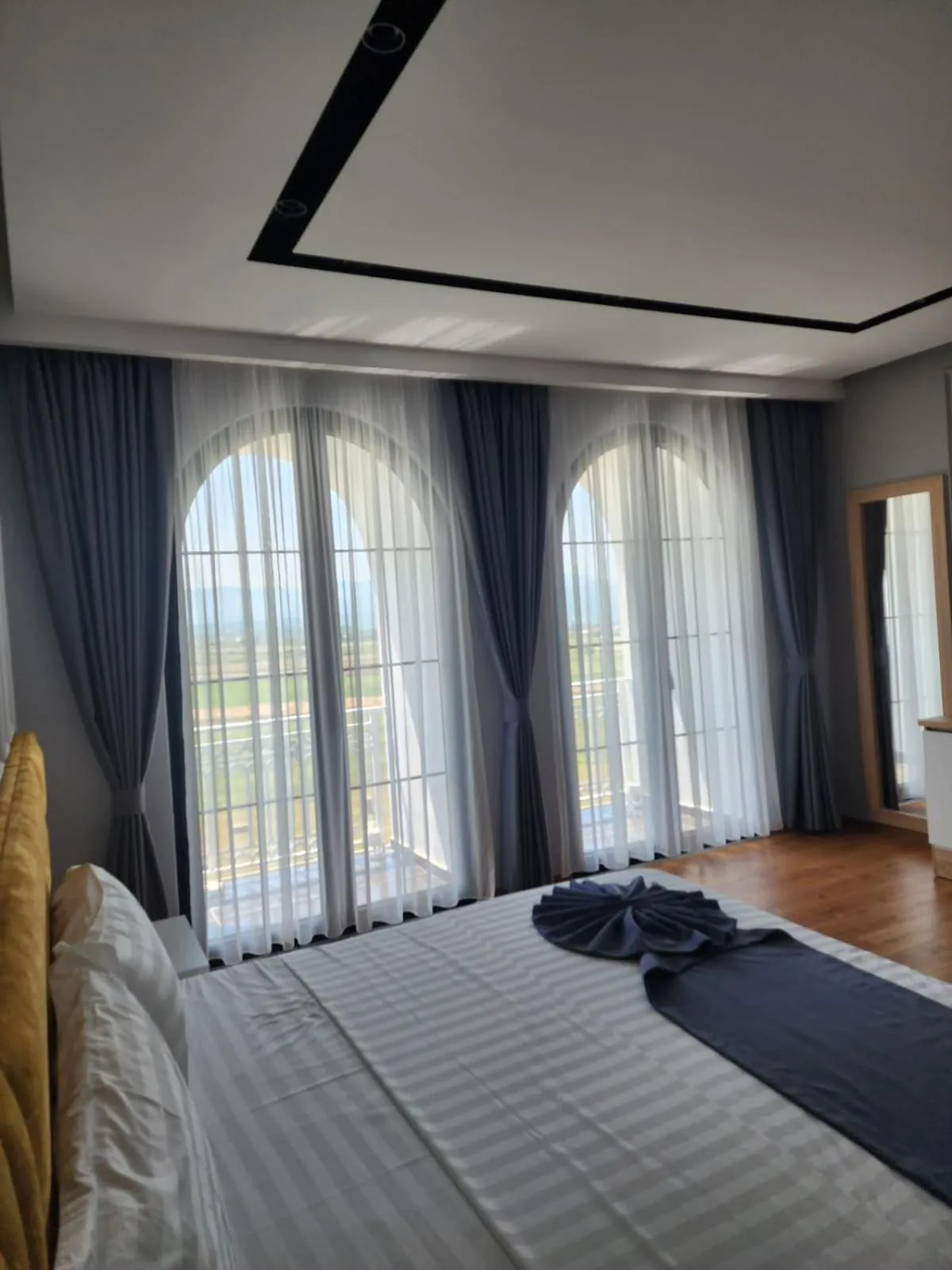 Bed in Imperador Palace Hotel Restorant