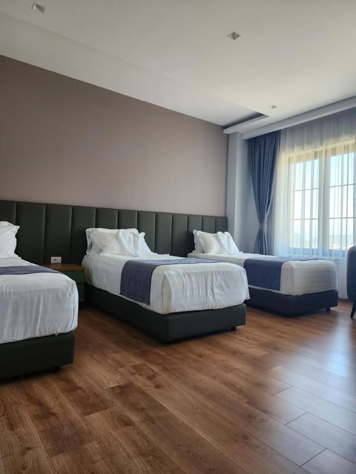 Bed in Imperador Palace Hotel Restorant