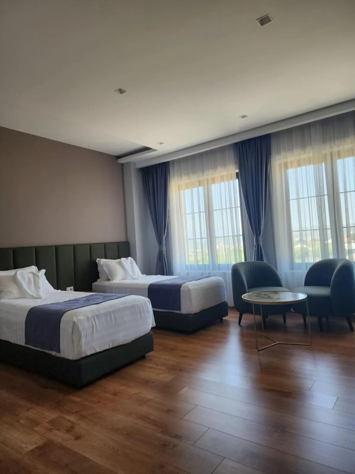 Bed in Imperador Palace Hotel Restorant