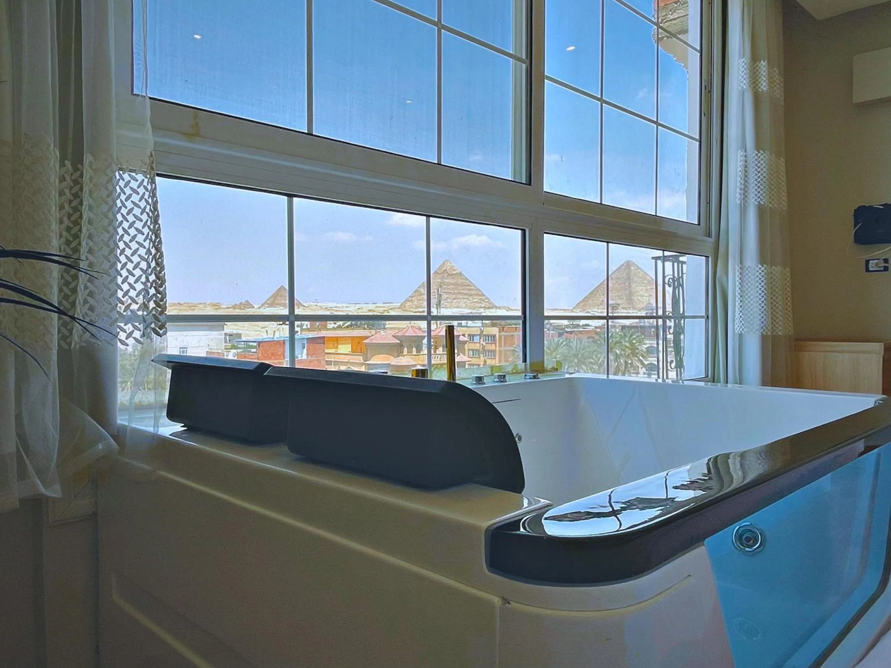 Nearby landmark, Bed in Palm Pyramids View INN