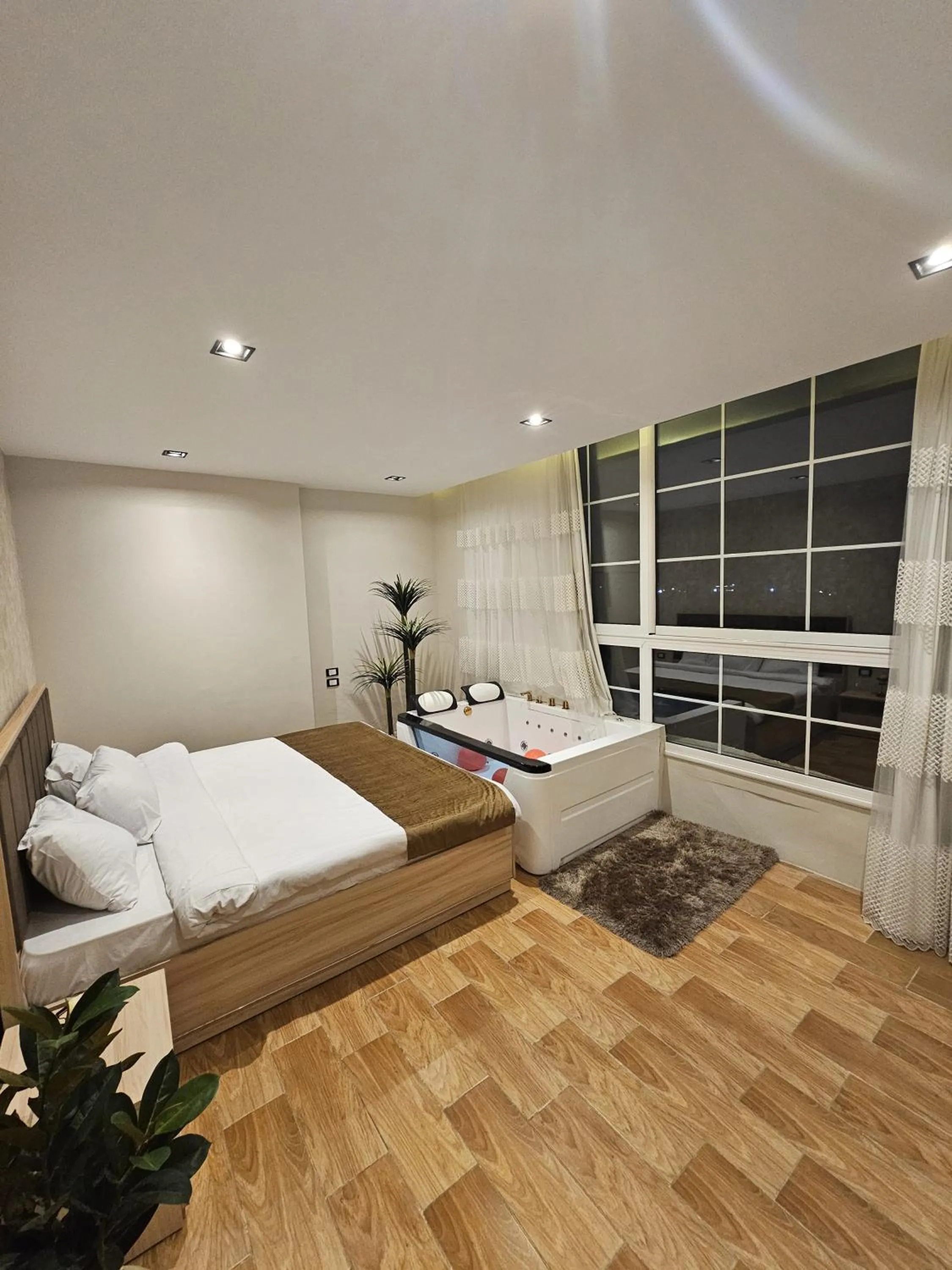 Bed in Palm Pyramids View INN
