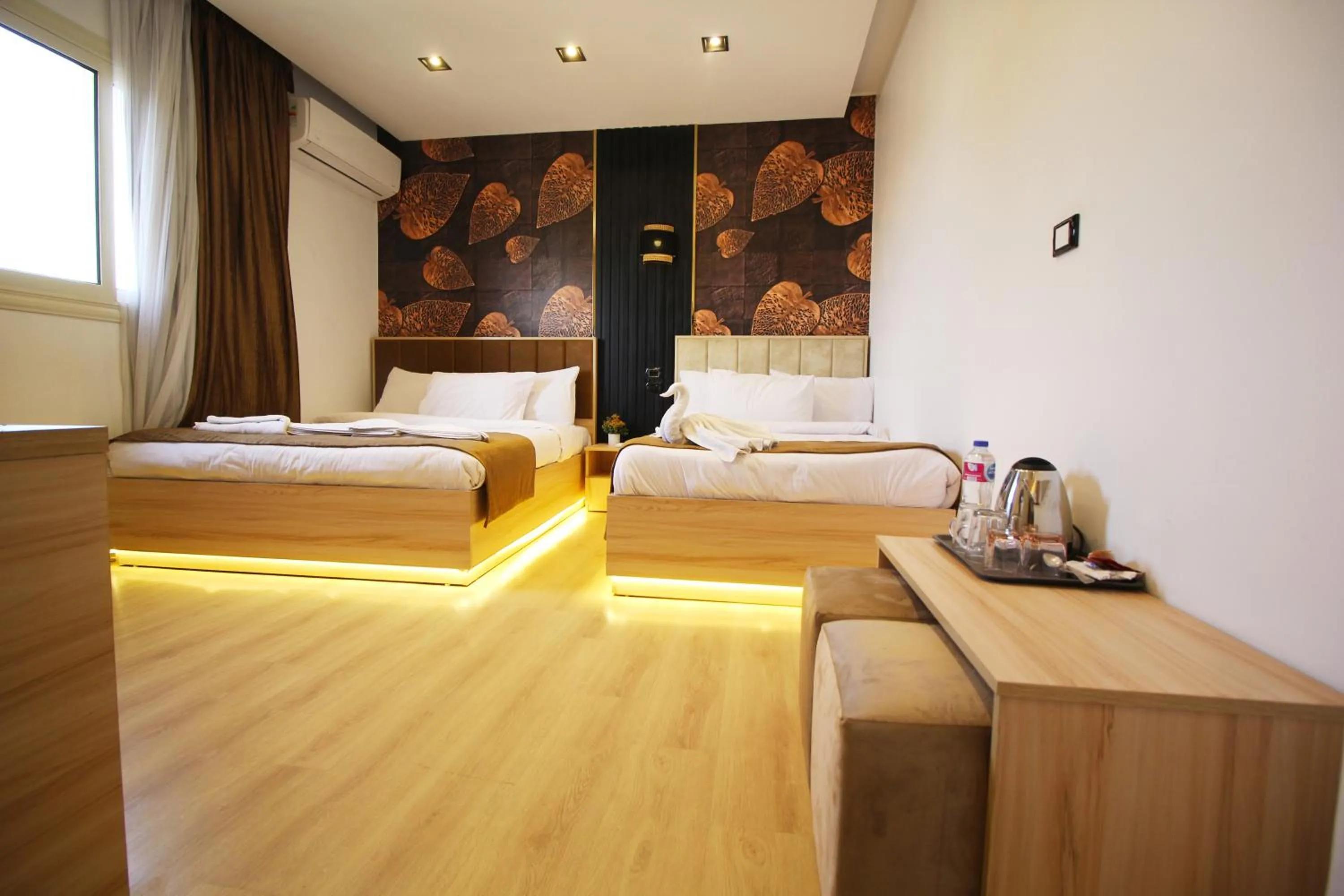 Bed in Palm Pyramids View INN