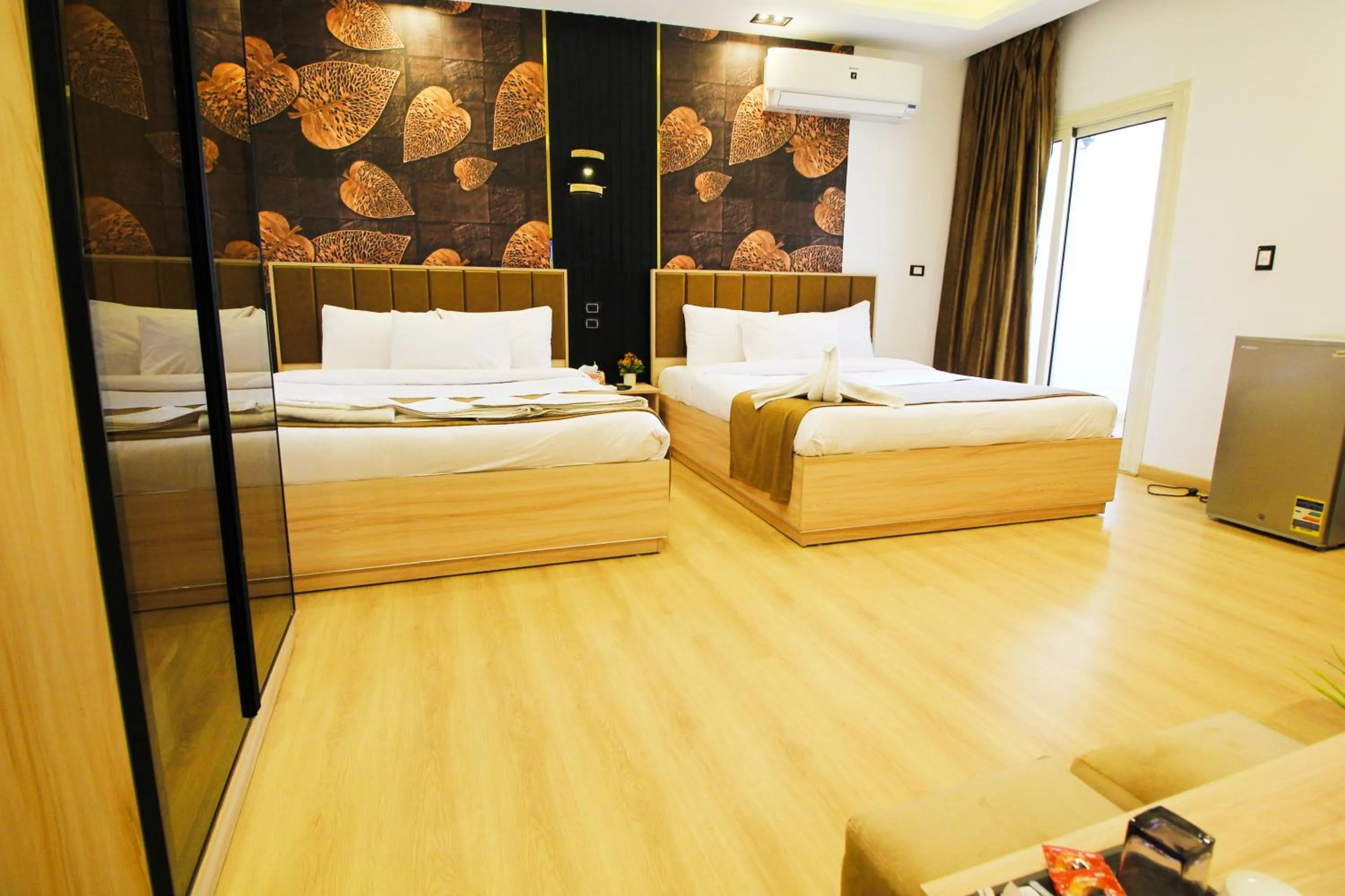 Photo of the whole room, Bed in Palm Pyramids View INN