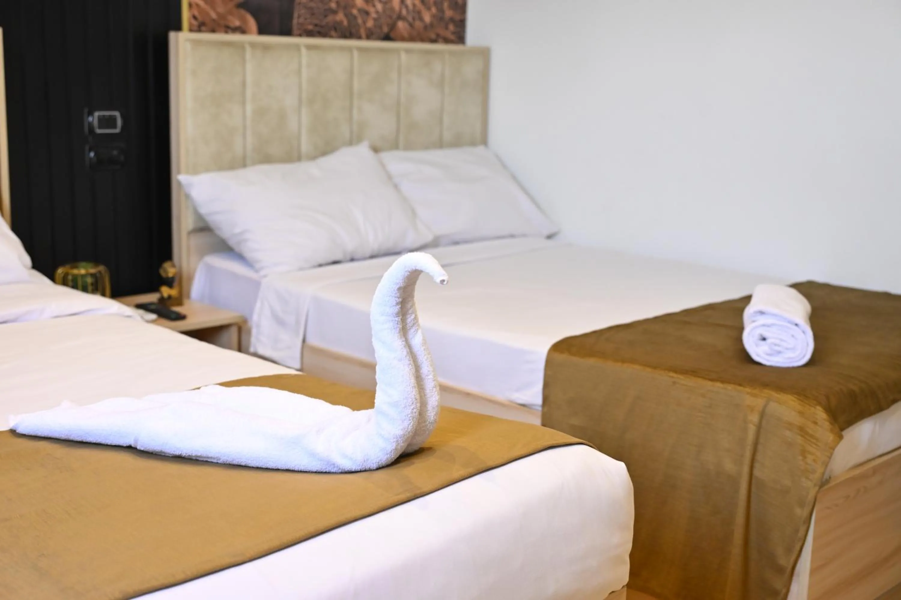 Bed in Palm Pyramids View INN