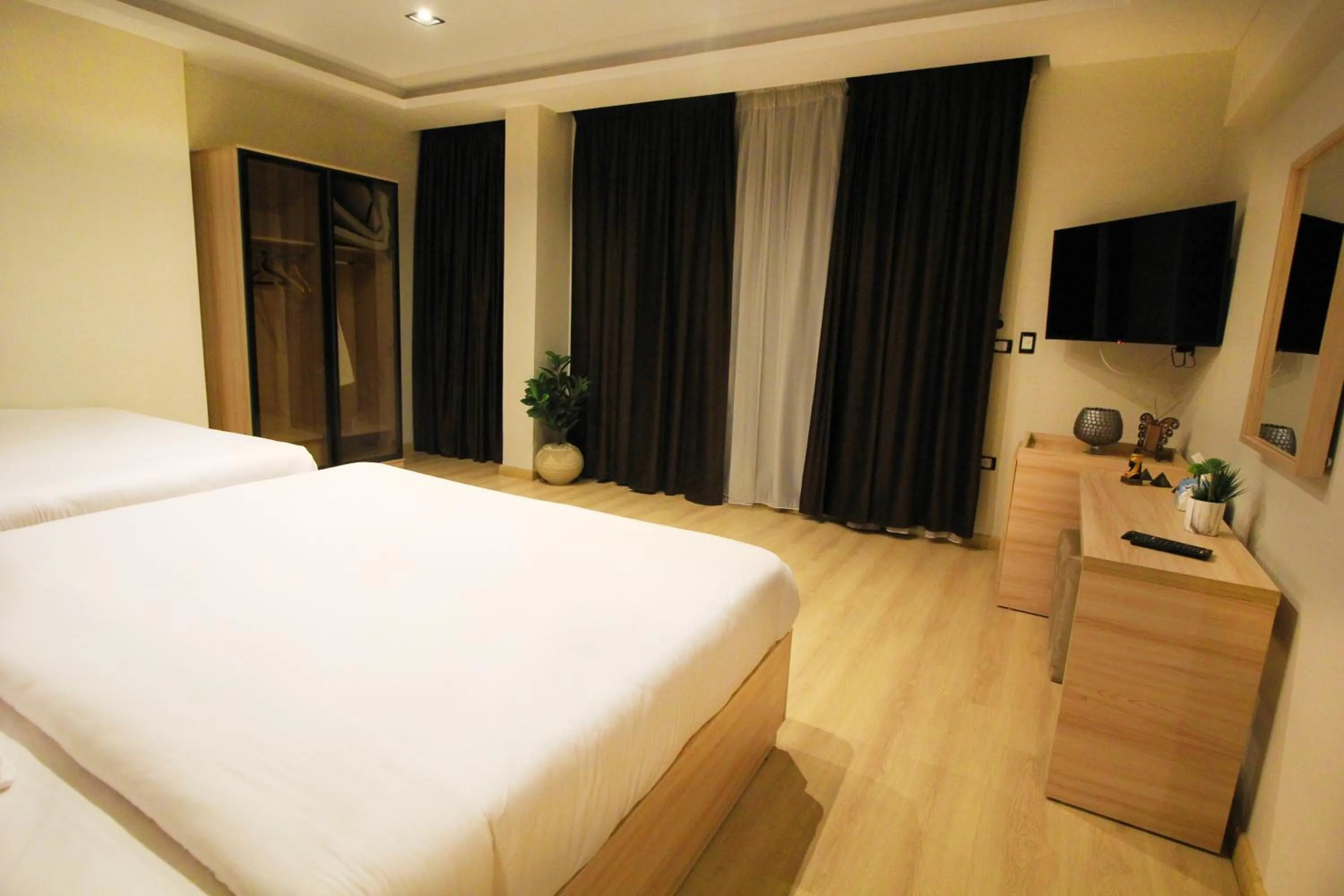 TV and multimedia, Bed in Palm Pyramids View INN