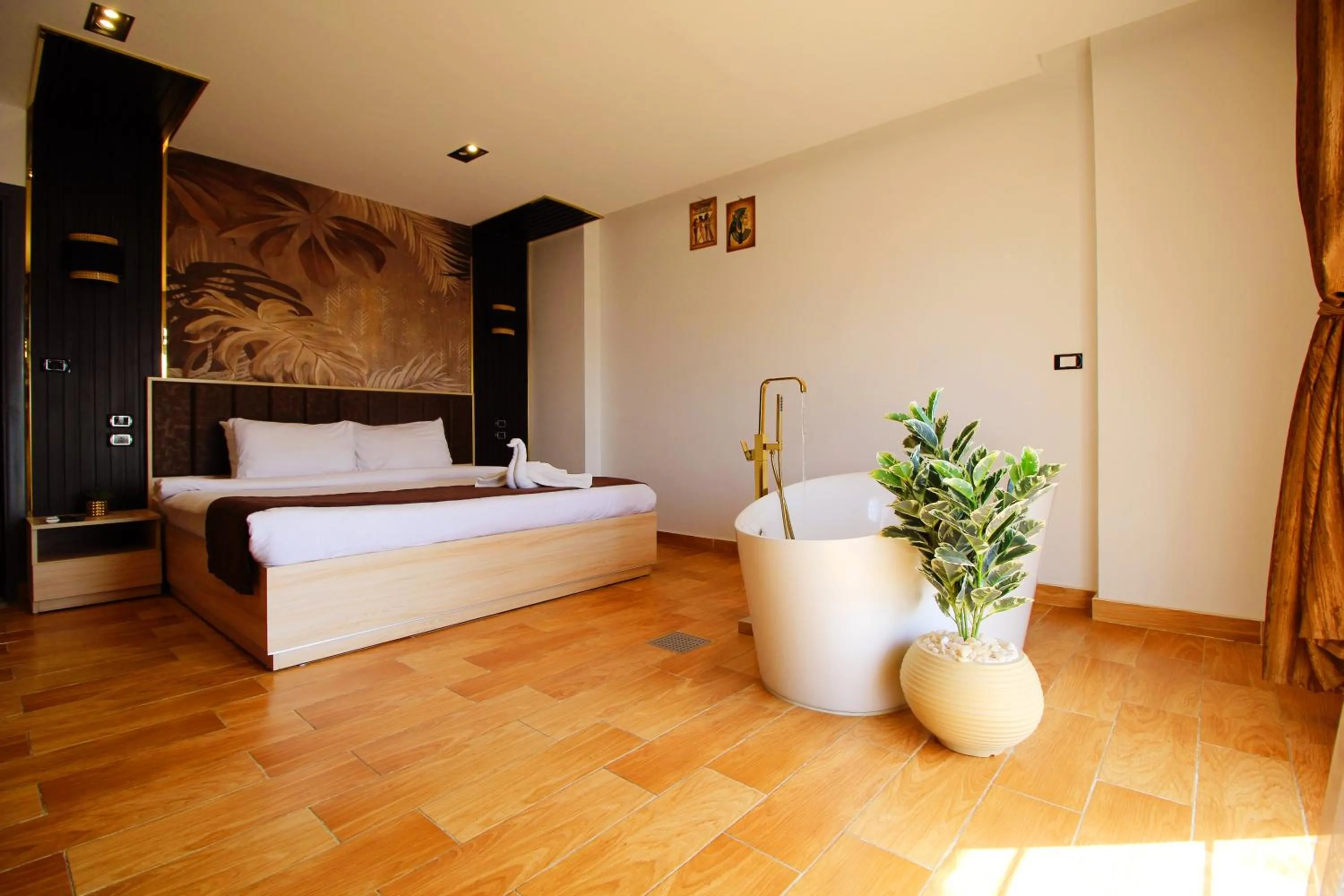 Bed in Palm Pyramids View INN