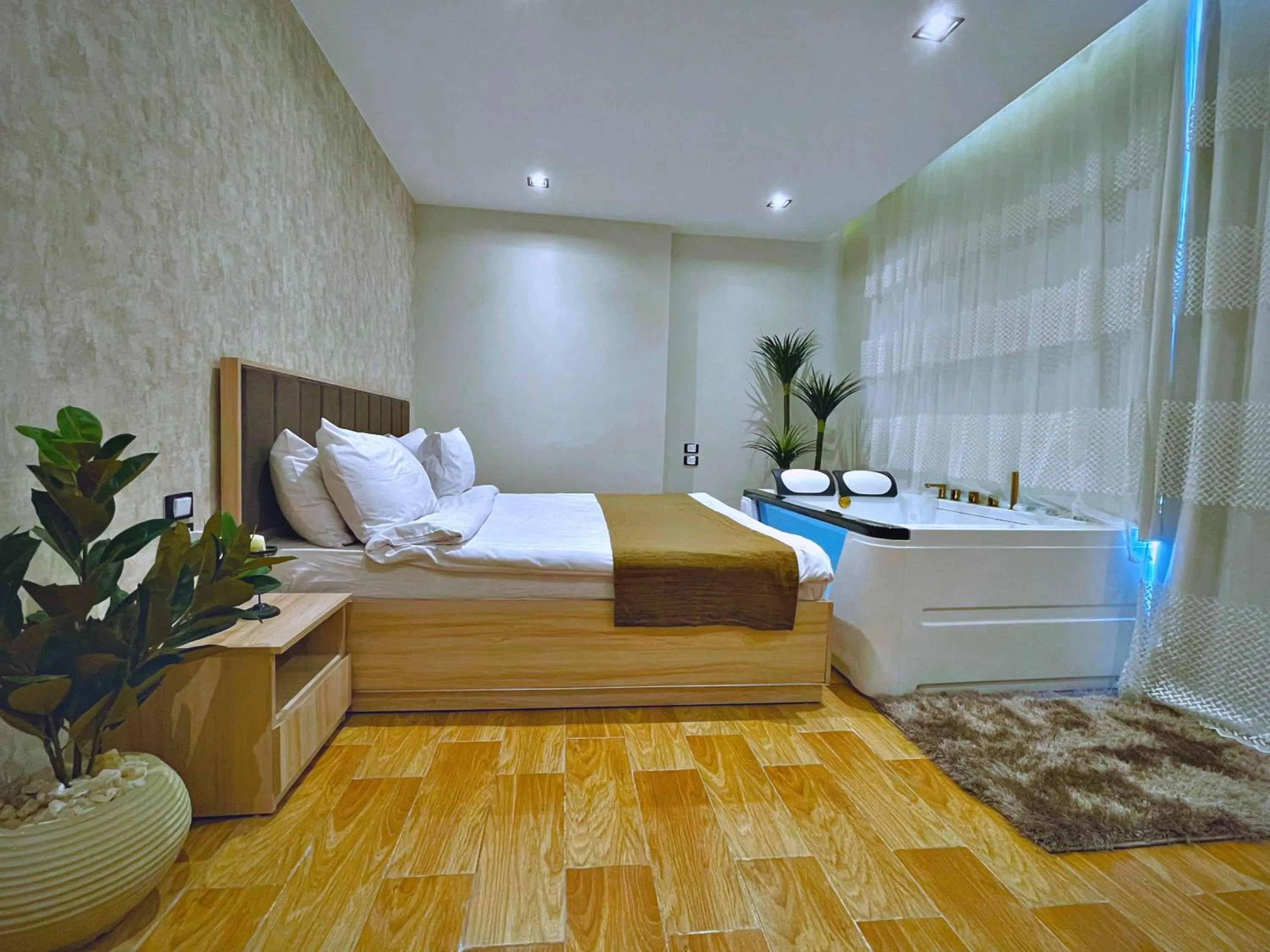 Bed in Palm Pyramids View INN
