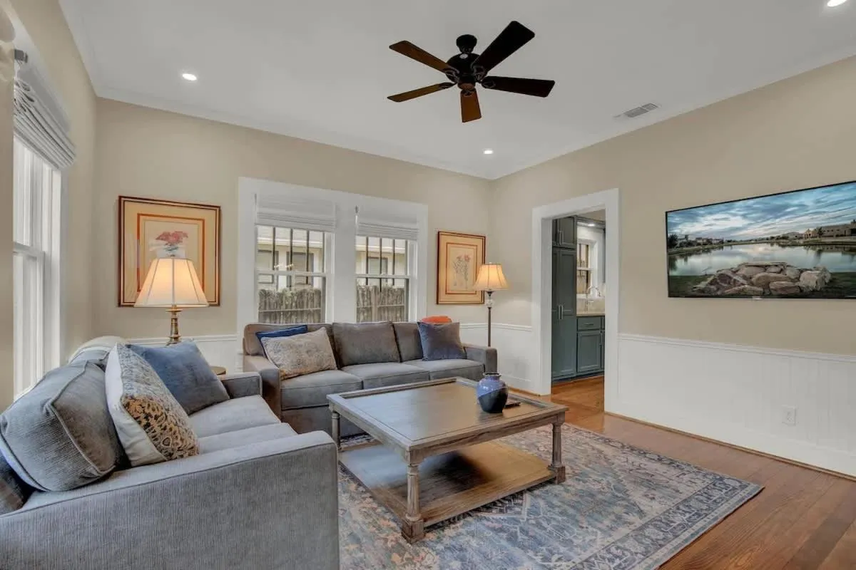 Living room in Charming Craftsman Home!-2 BLKS from Main St!