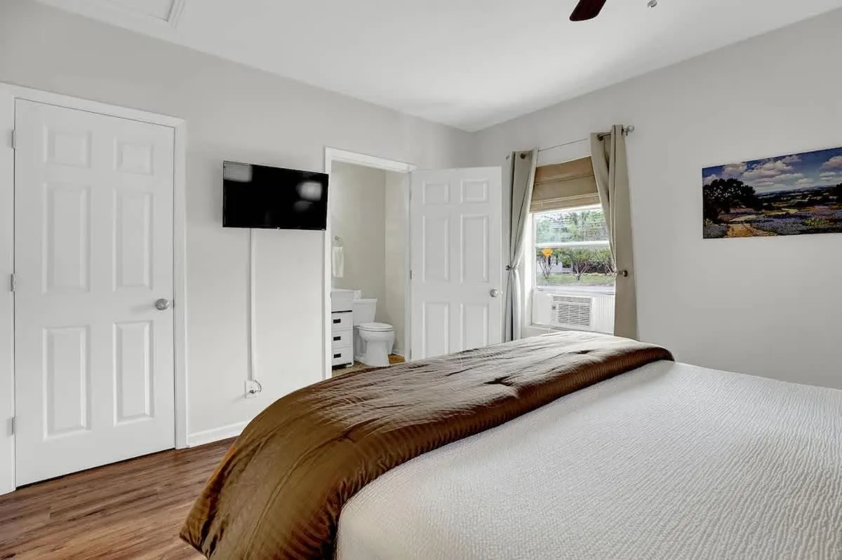 Bed in Gorgeous Bluebonnet House with Deck and Fire Pit