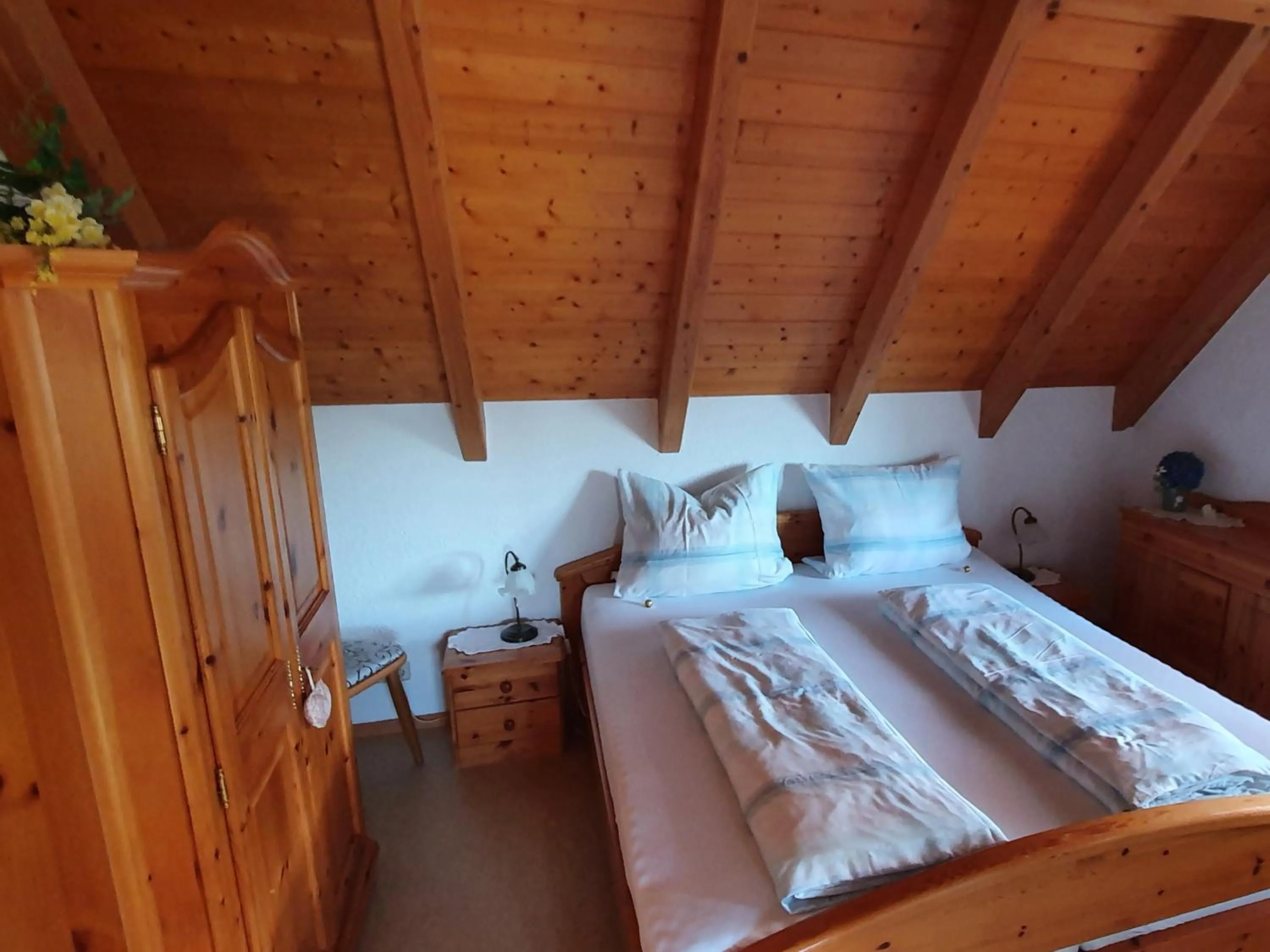 Bedroom, Bed in Ferienwohnungen Maierhof Oberried