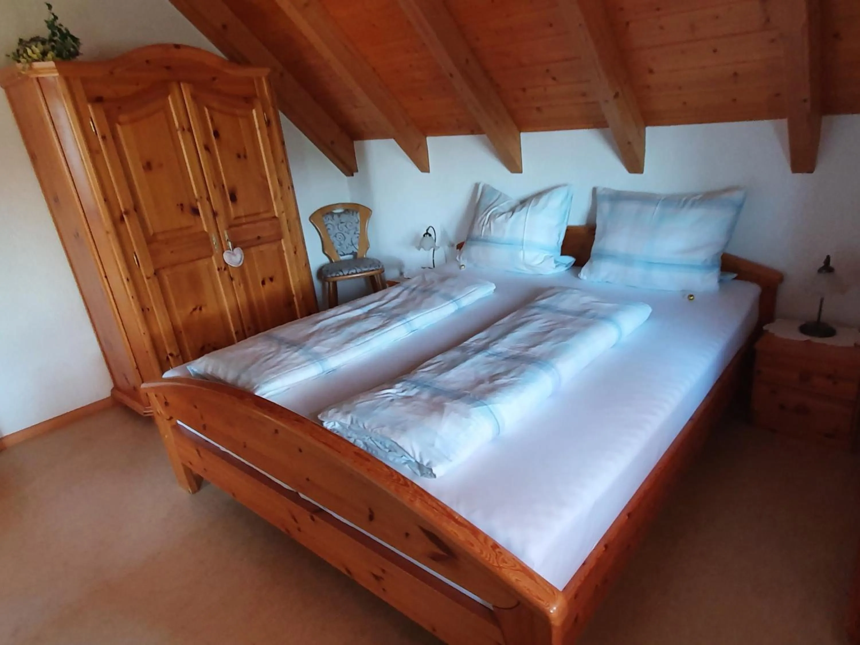 Bedroom, Bed in Ferienwohnungen Maierhof Oberried