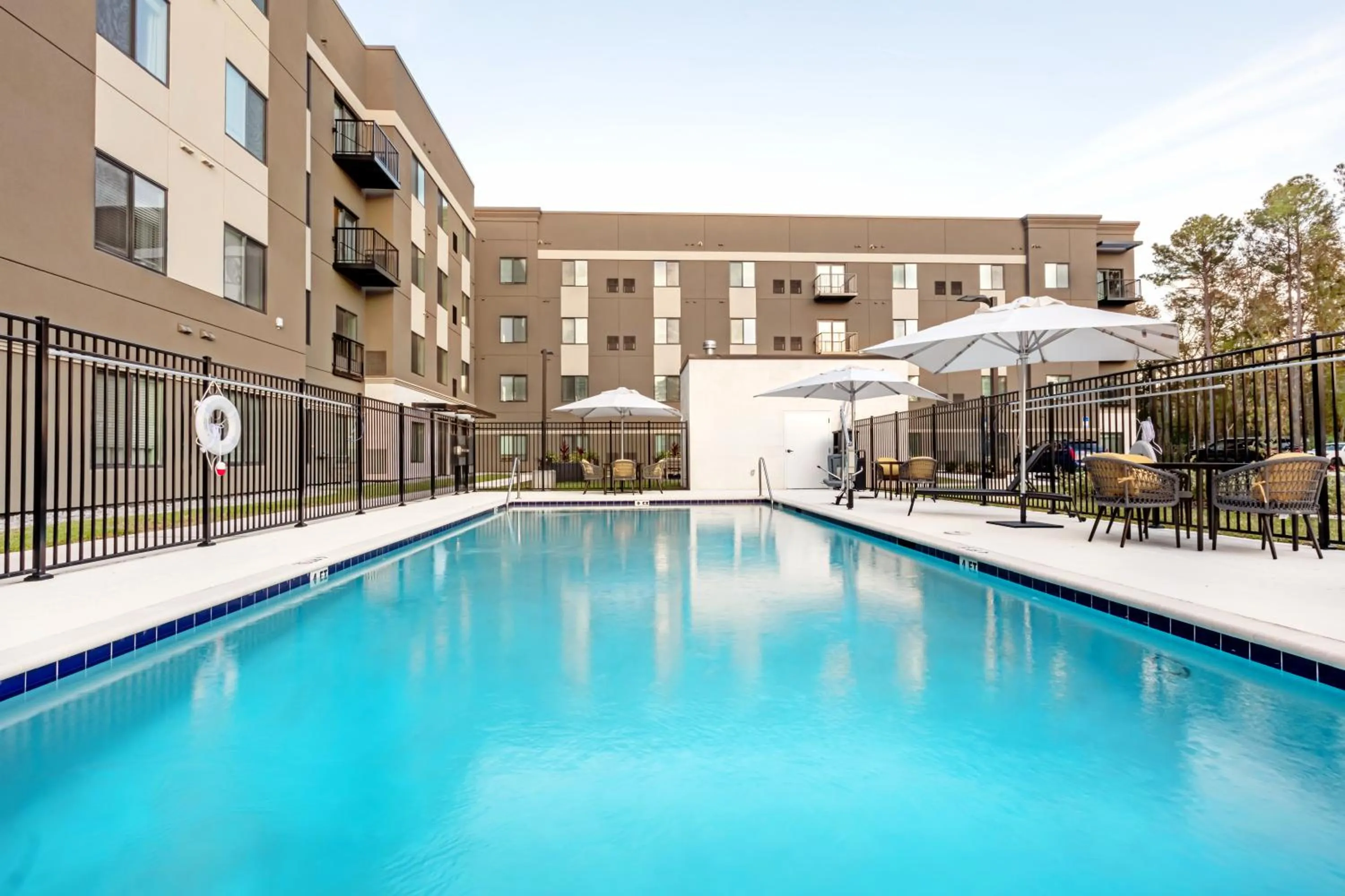Swimming pool in WaterWalk Extended Stay by Wyndham Jacksonville Deerwood Pk