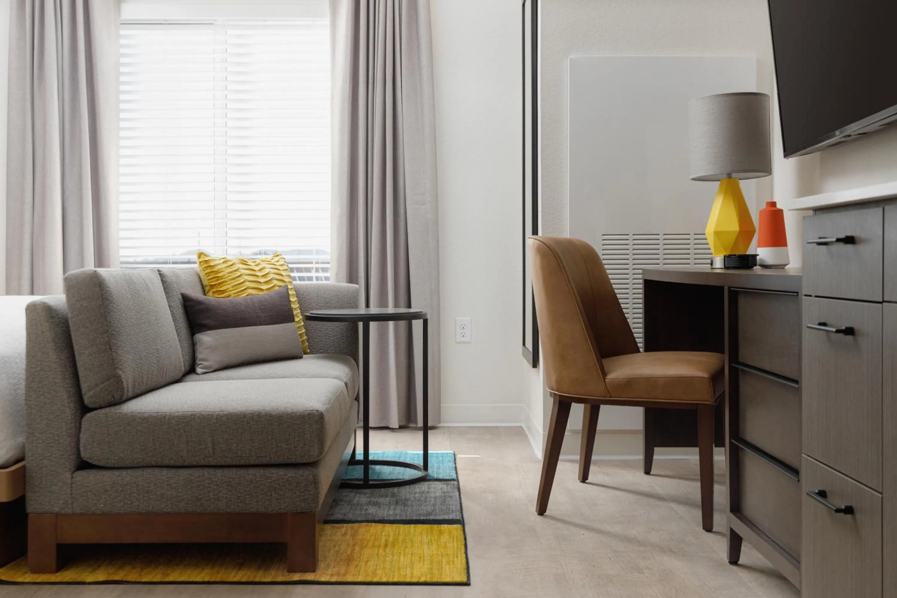 Living room in WaterWalk Extended Stay by Wyndham Jacksonville Deerwood Pk