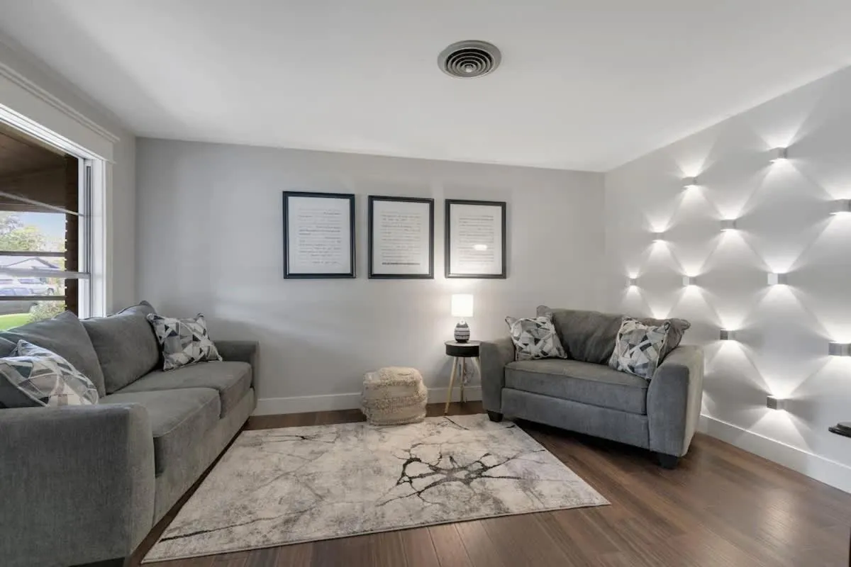 Living room in Gorgeous Home with Grill 5Min from MainSt!