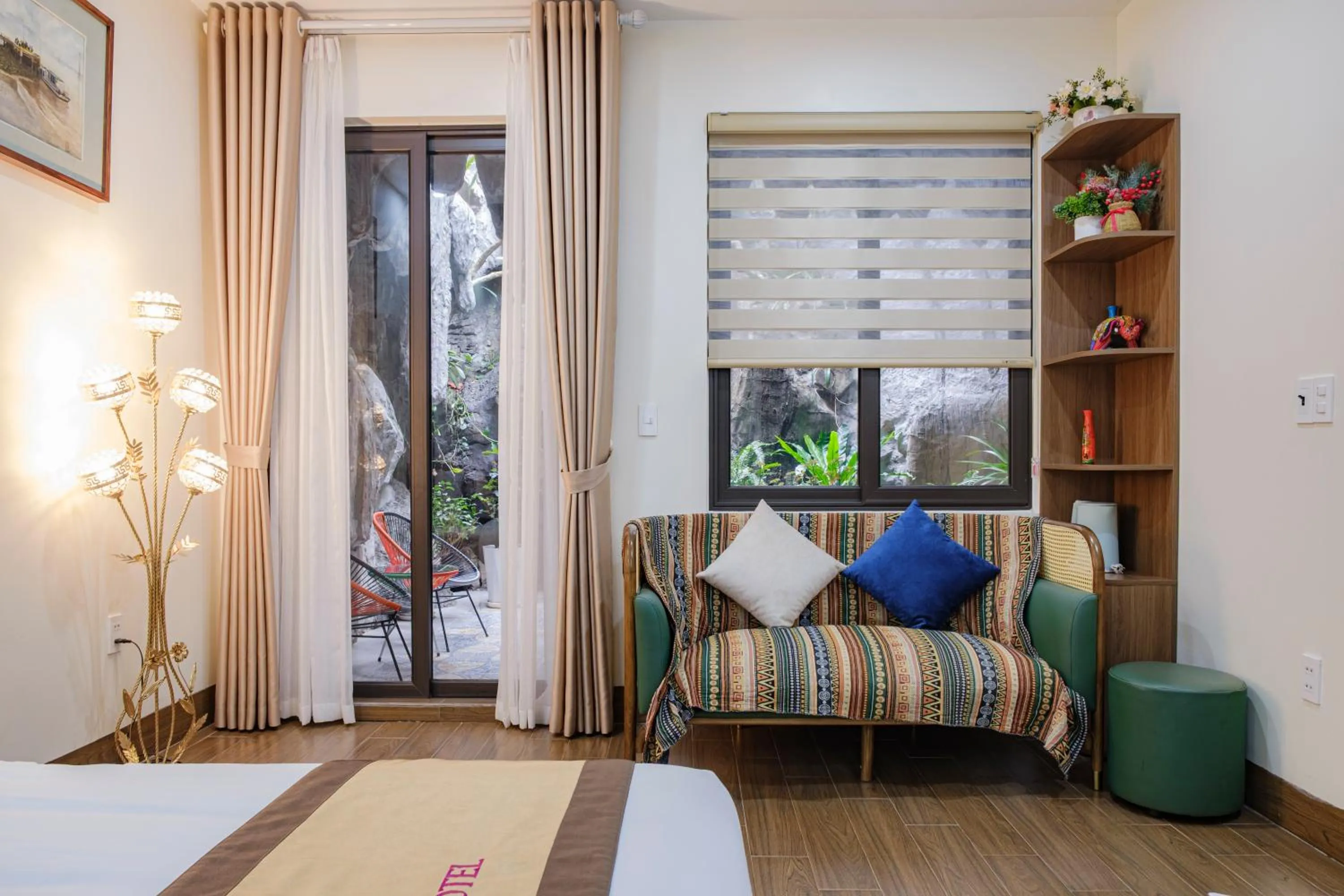 Seating area, Bed in Roza Palace Cat Ba