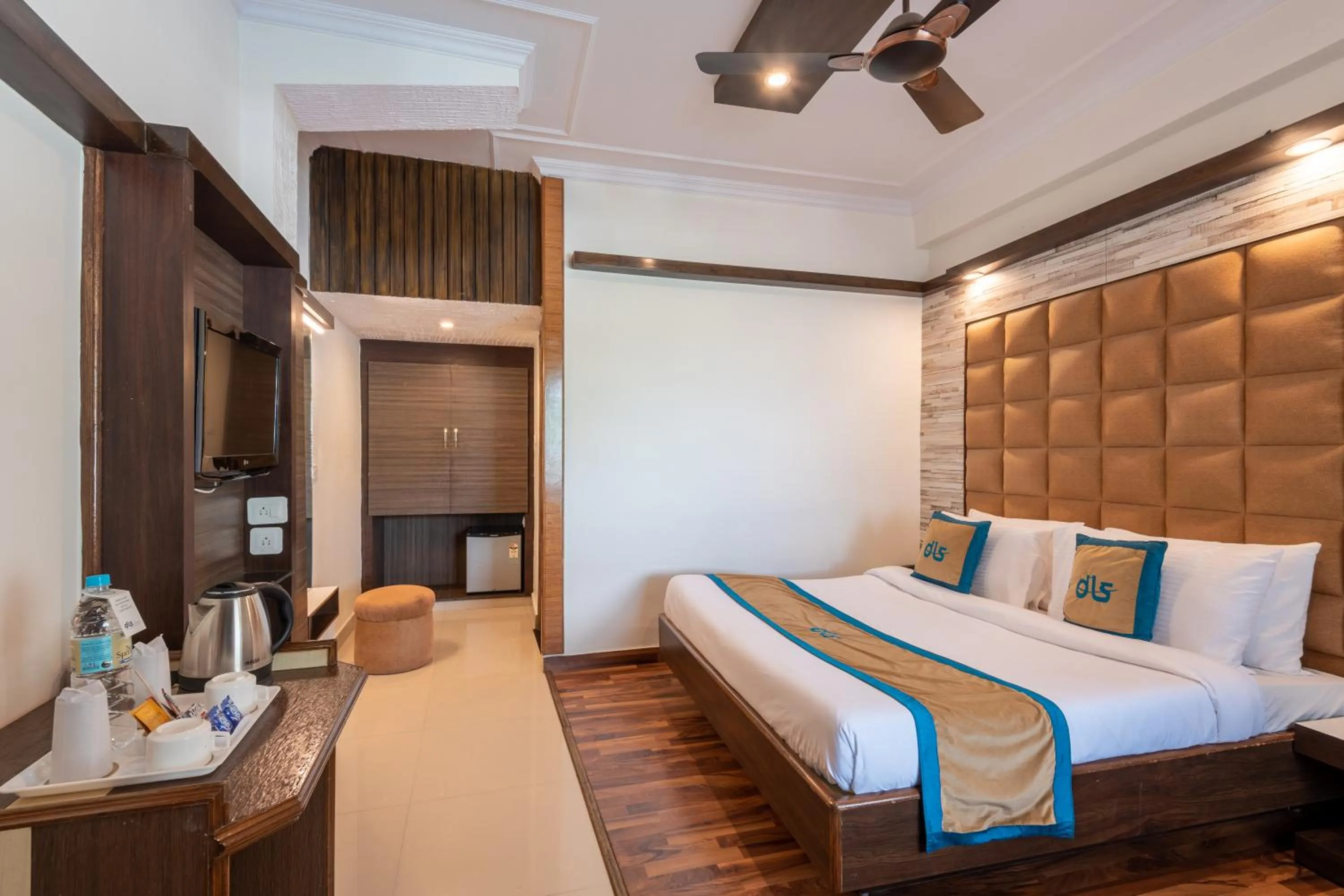 Bed in Meghavan Resort By DLS Hotels