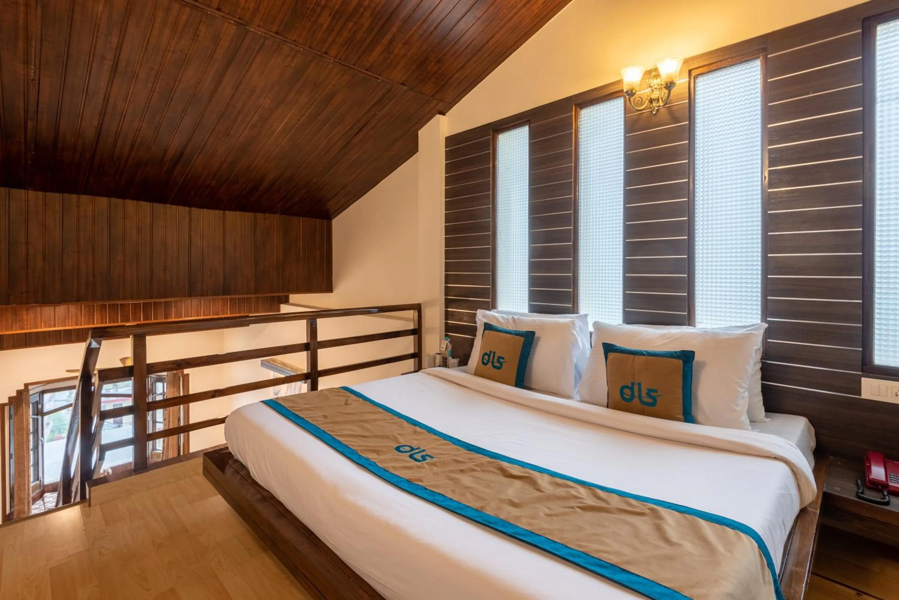 Bed in Meghavan Resort By DLS Hotels