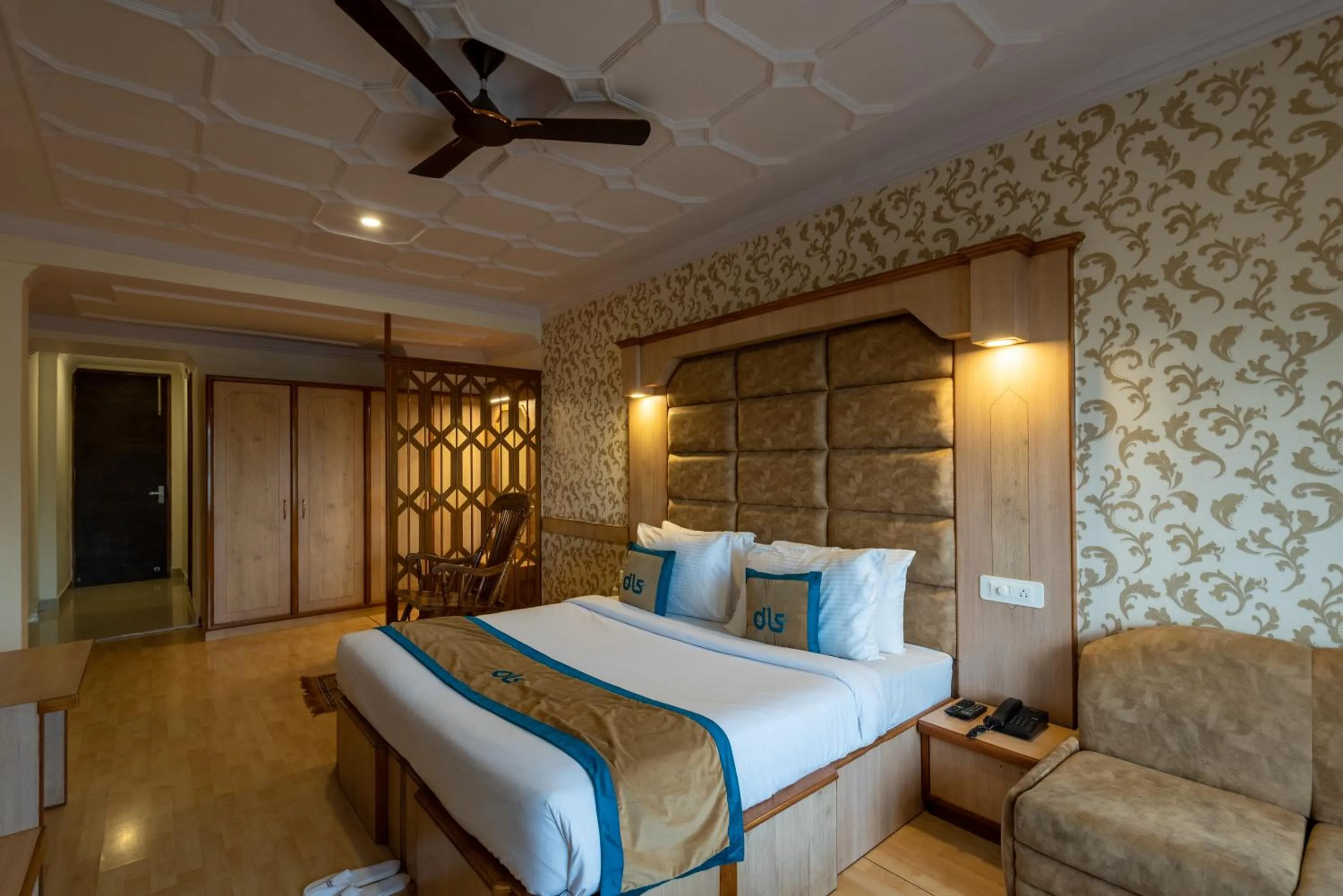 Bed in Meghavan Resort By DLS Hotels