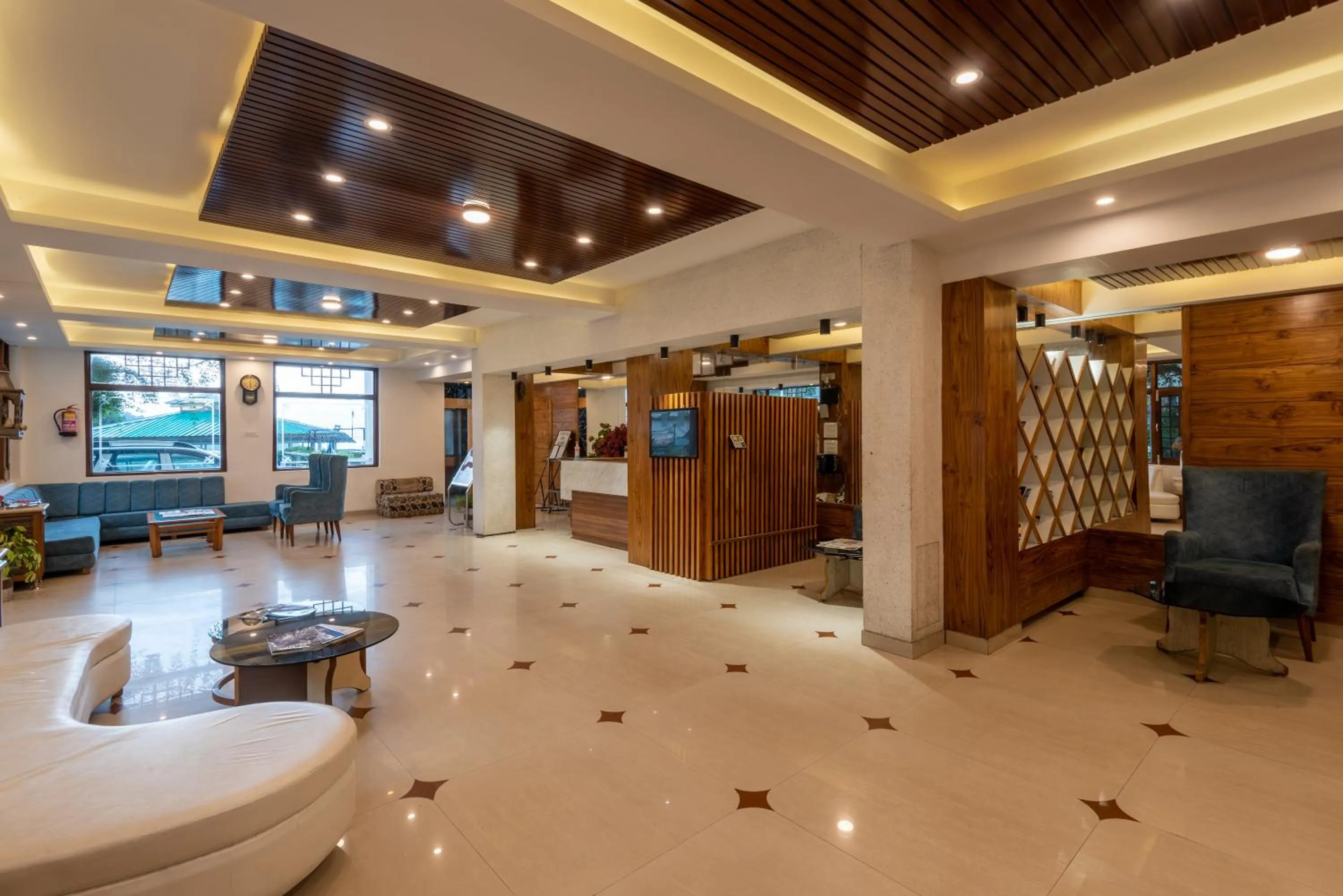 Living room, Lobby/Reception in Meghavan Resort By DLS Hotels
