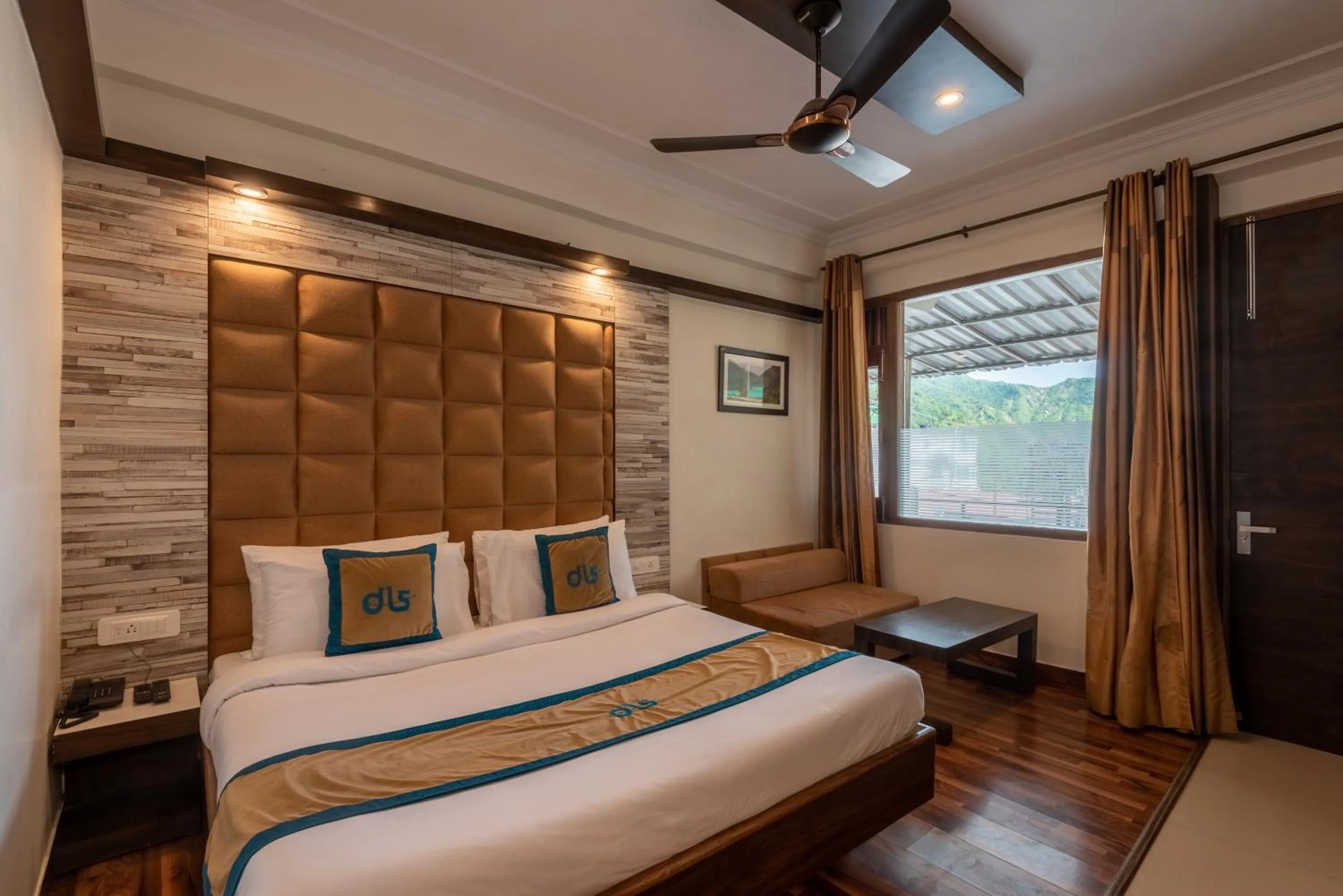 Bed in Meghavan Resort By DLS Hotels