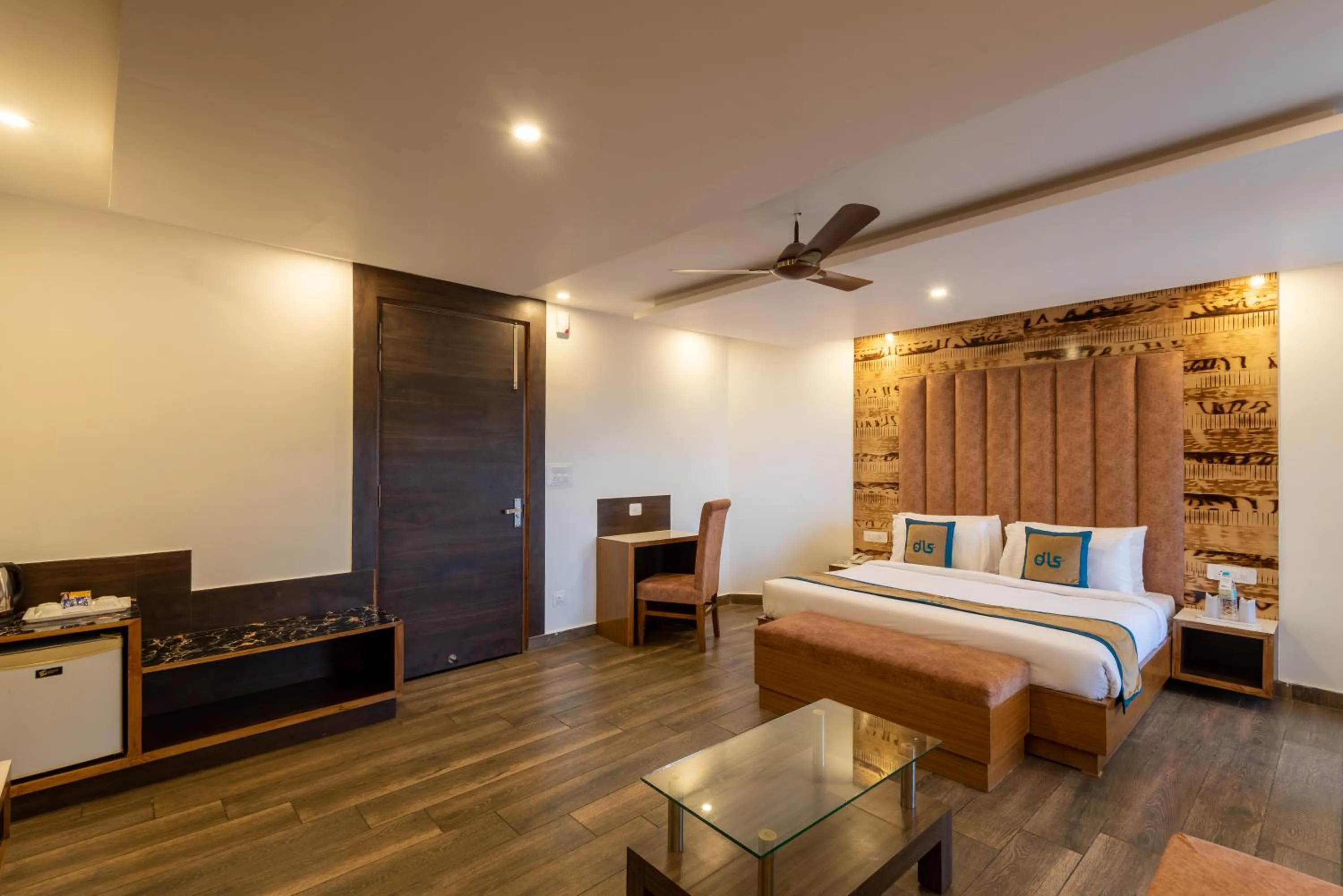 Bed, TV/Entertainment Center in Meghavan Resort By DLS Hotels