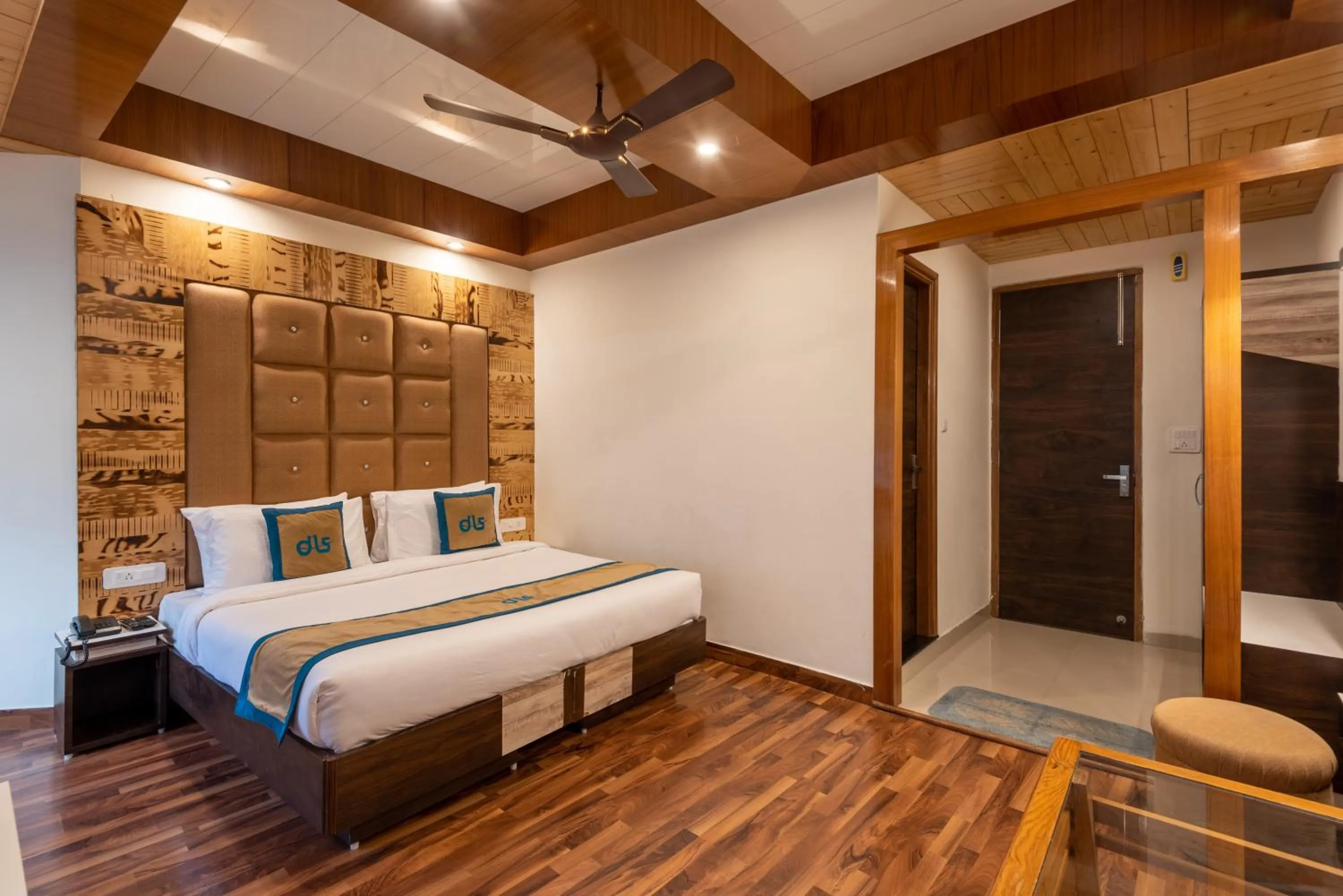 Bed in Meghavan Resort By DLS Hotels