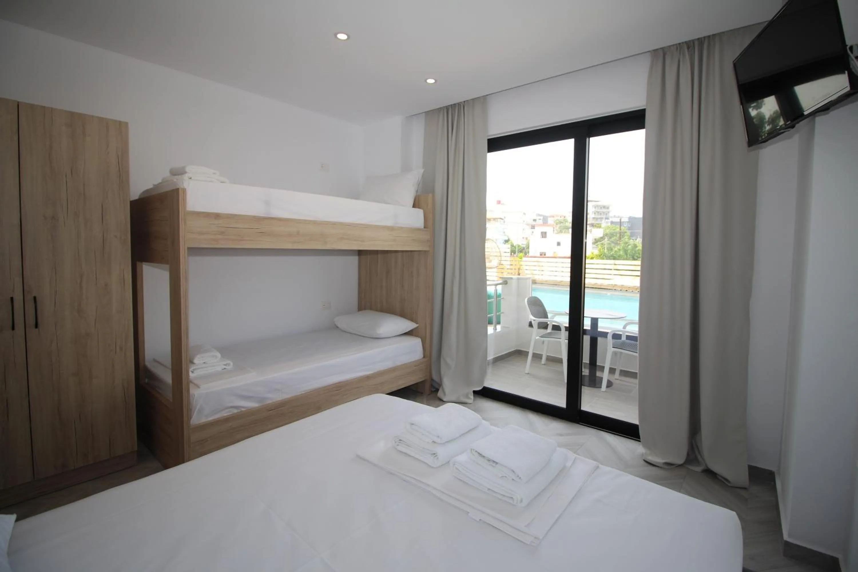 Pool view, Bed in Noa Boutique Hotel