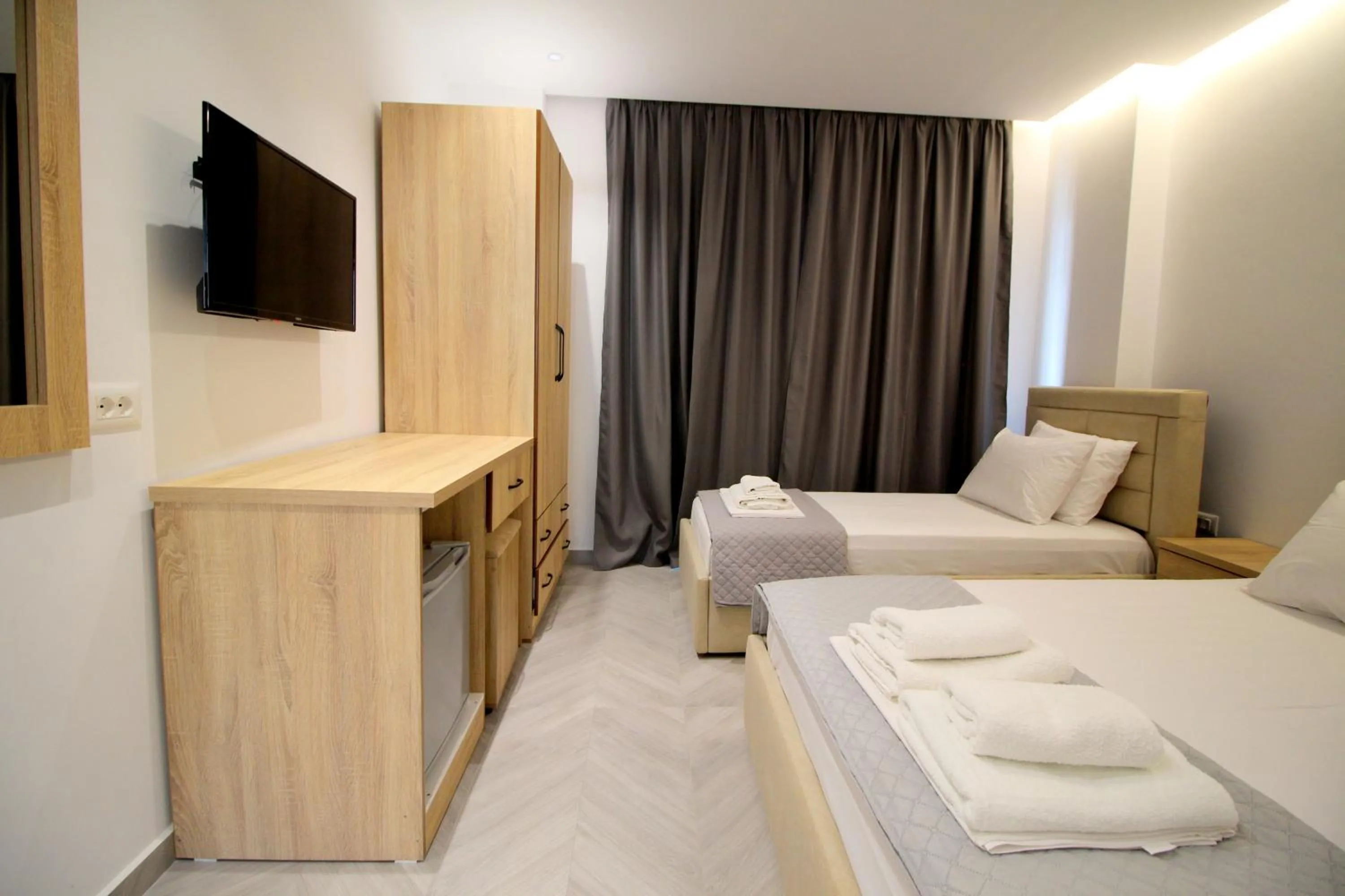 TV and multimedia, Bed in Noa Boutique Hotel