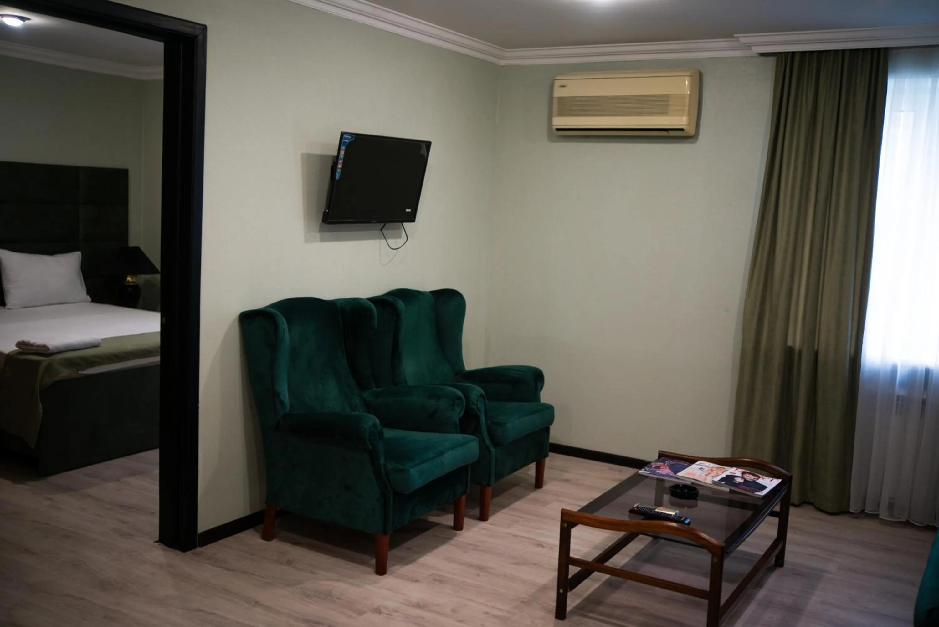 Seating area, Bed in RoseMary Inn