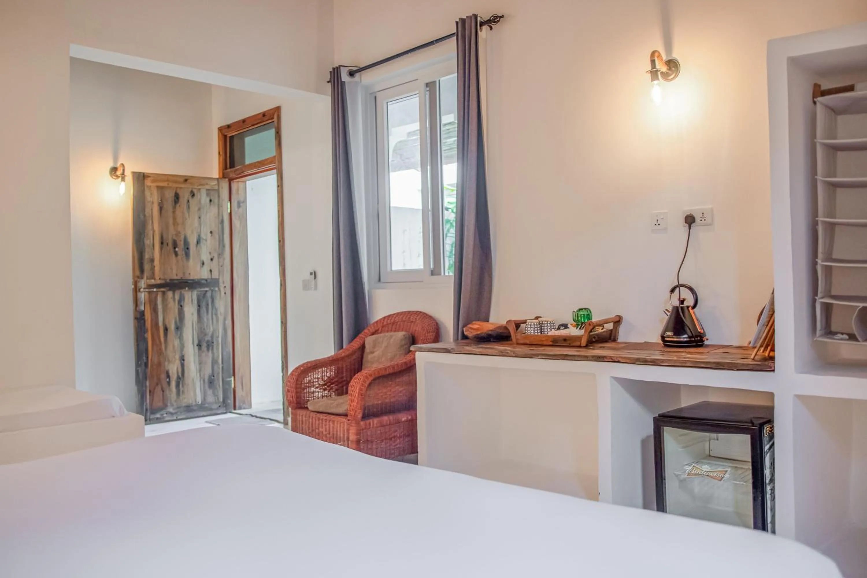 Property building, Bed in Cactus lodge Zanzibar